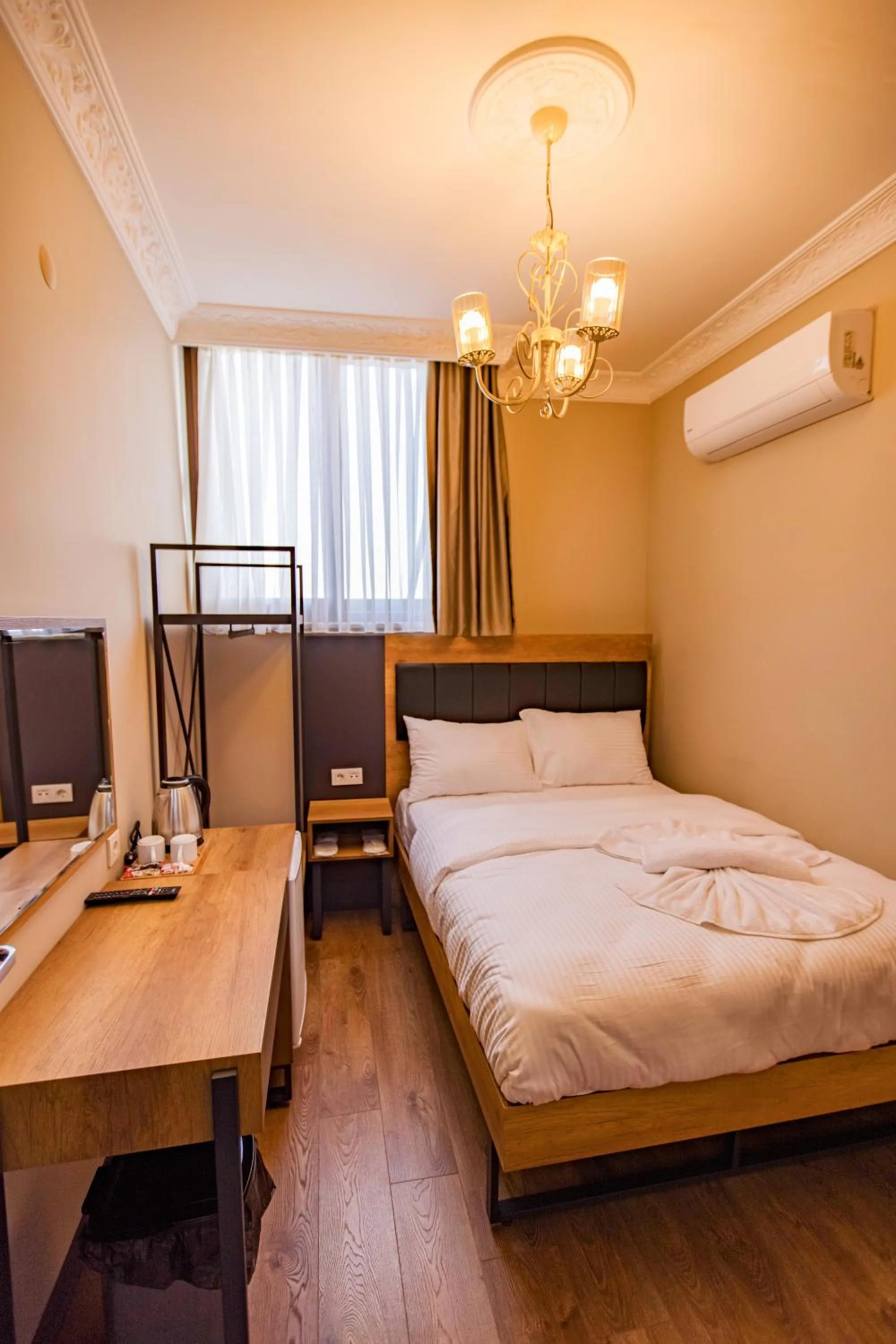 Bed in Grand Balyan Hotel & Restaurant