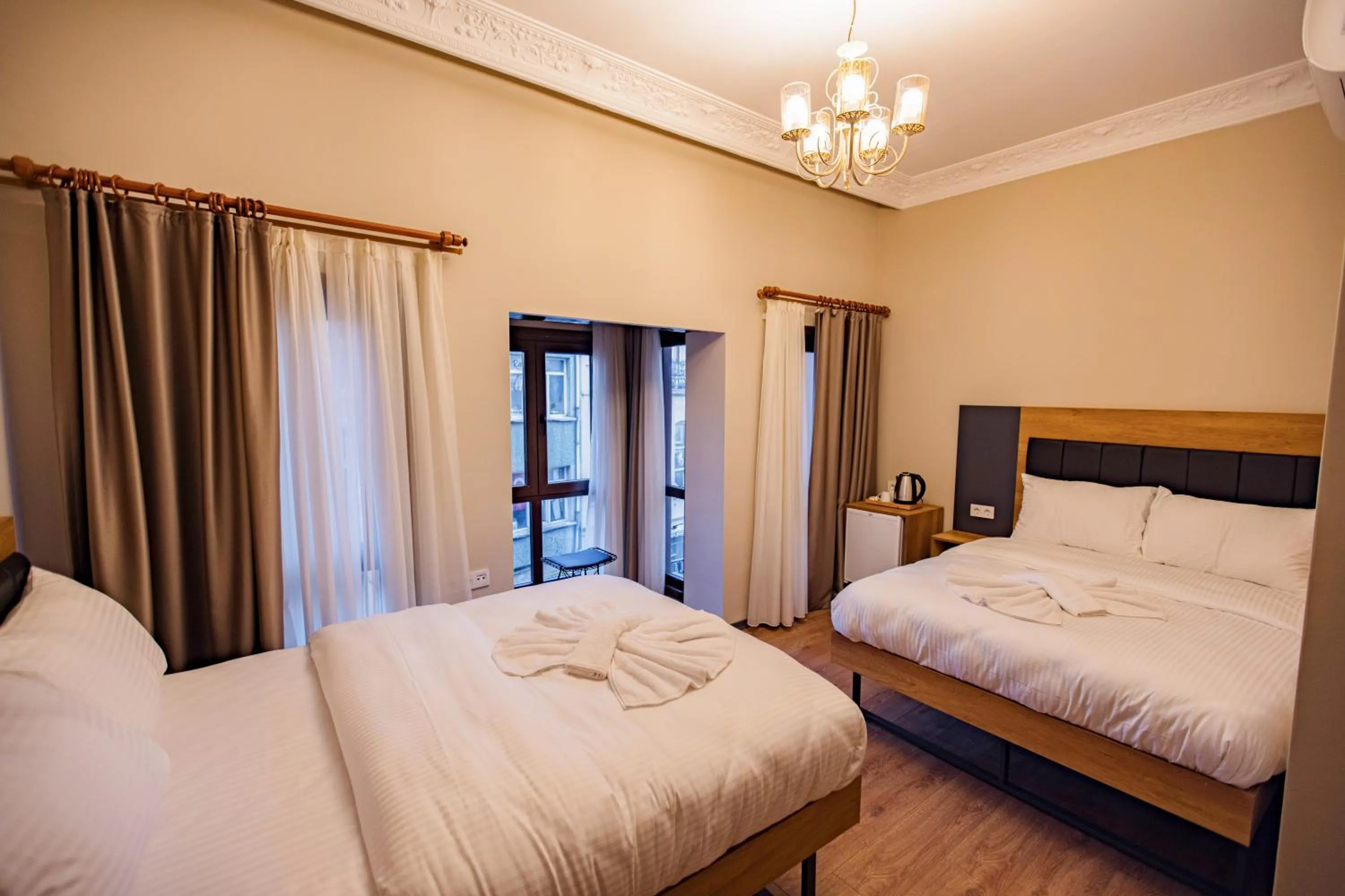 Bed in Grand Balyan Hotel & Restaurant