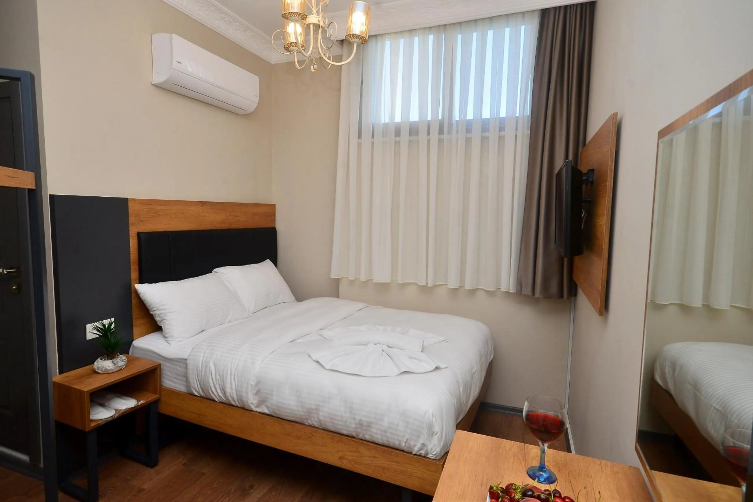 Bed in Grand Balyan Hotel & Restaurant