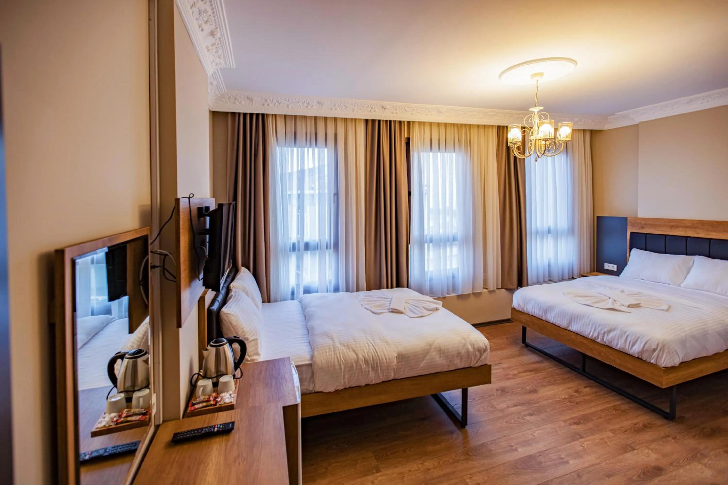 Bed in Grand Balyan Hotel & Restaurant