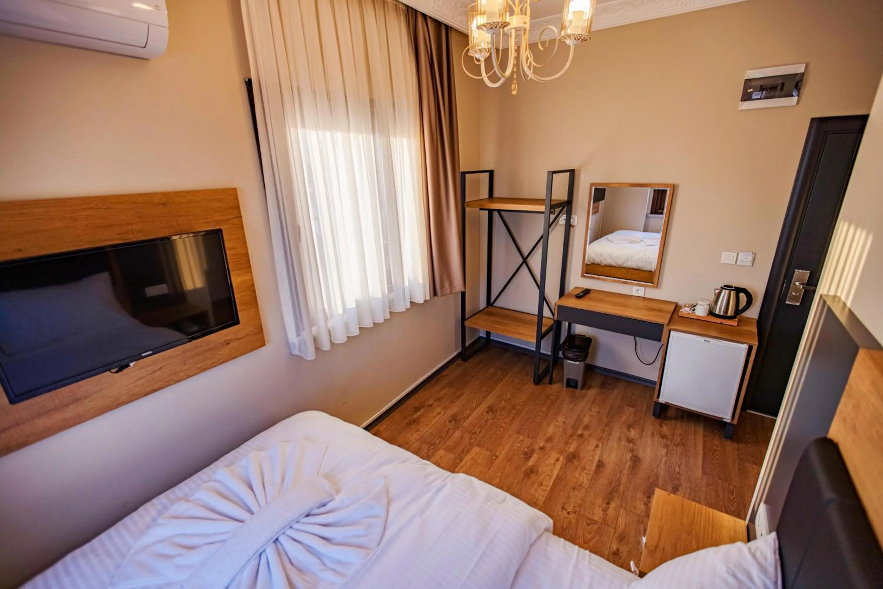 Bed in Grand Balyan Hotel & Restaurant