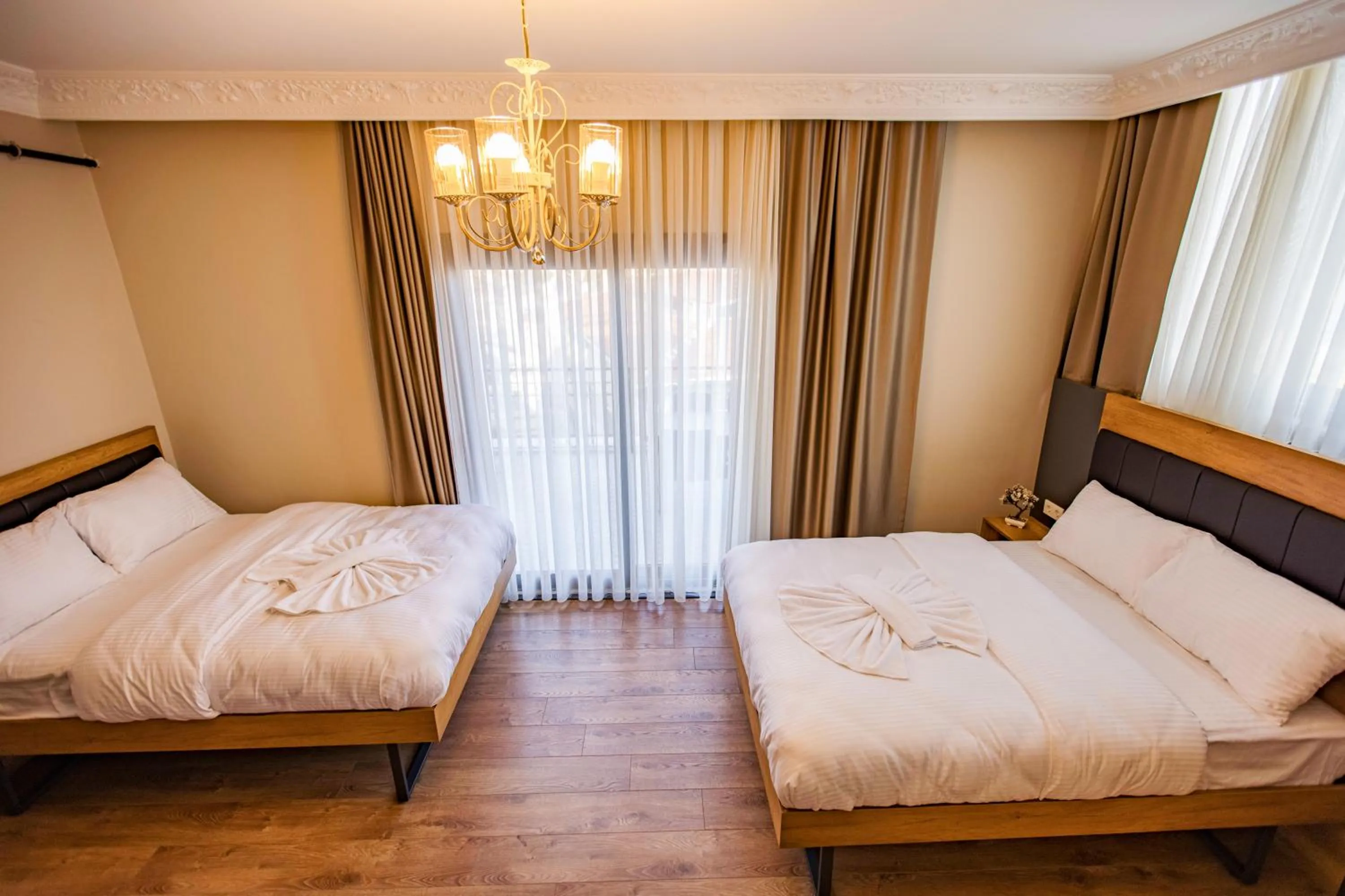 Bed in Grand Balyan Hotel & Restaurant