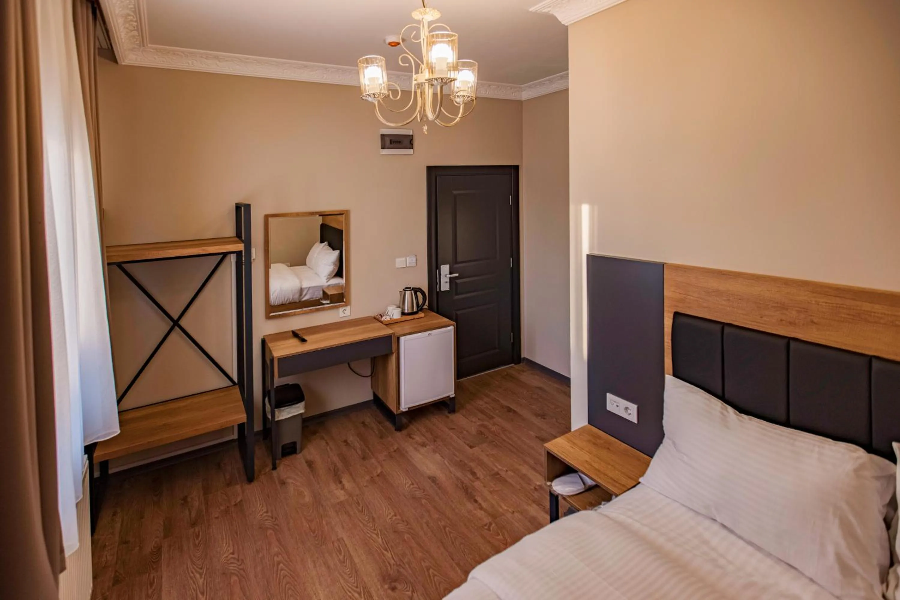 Bed in Grand Balyan Hotel & Restaurant