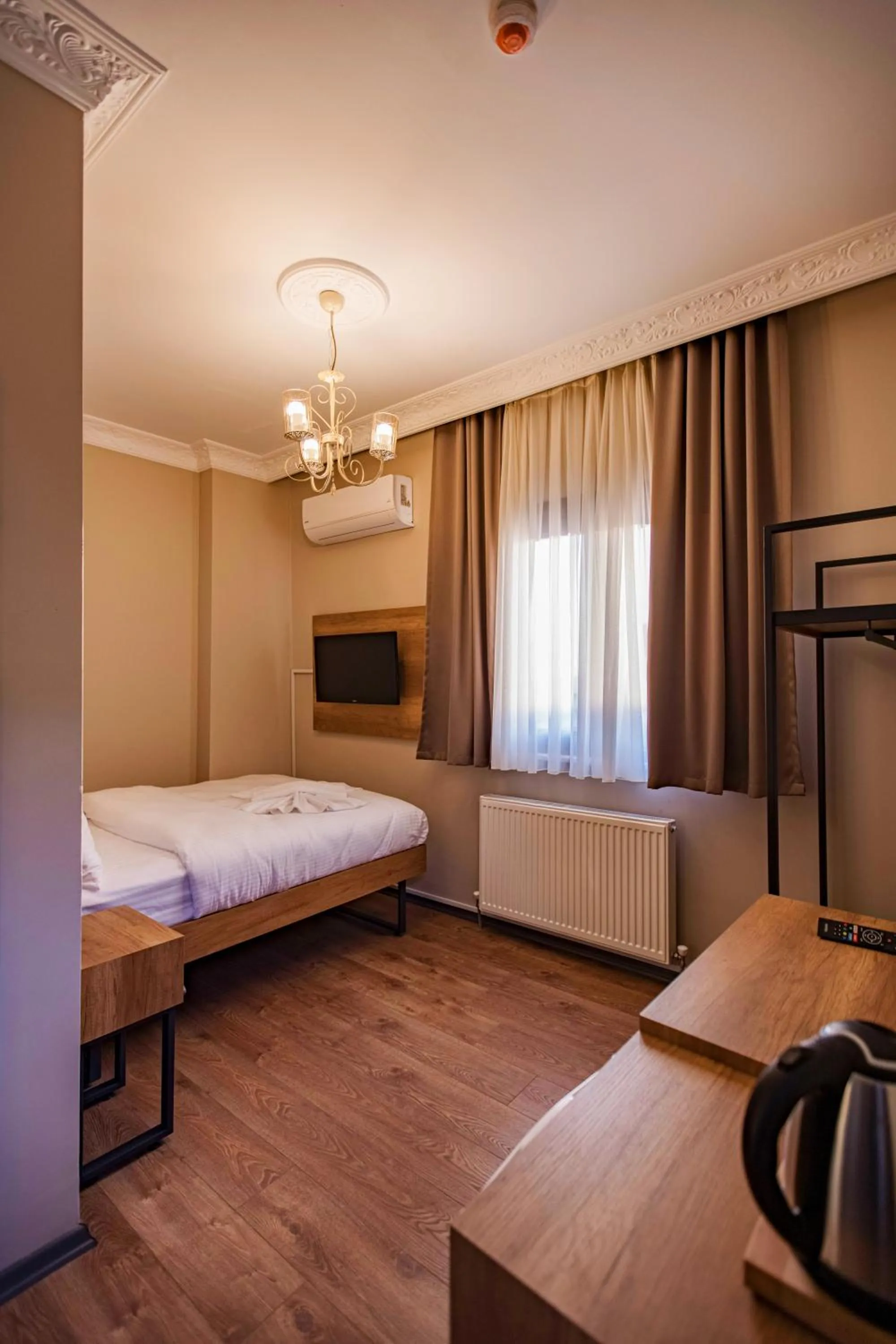 Bed in Grand Balyan Hotel & Restaurant