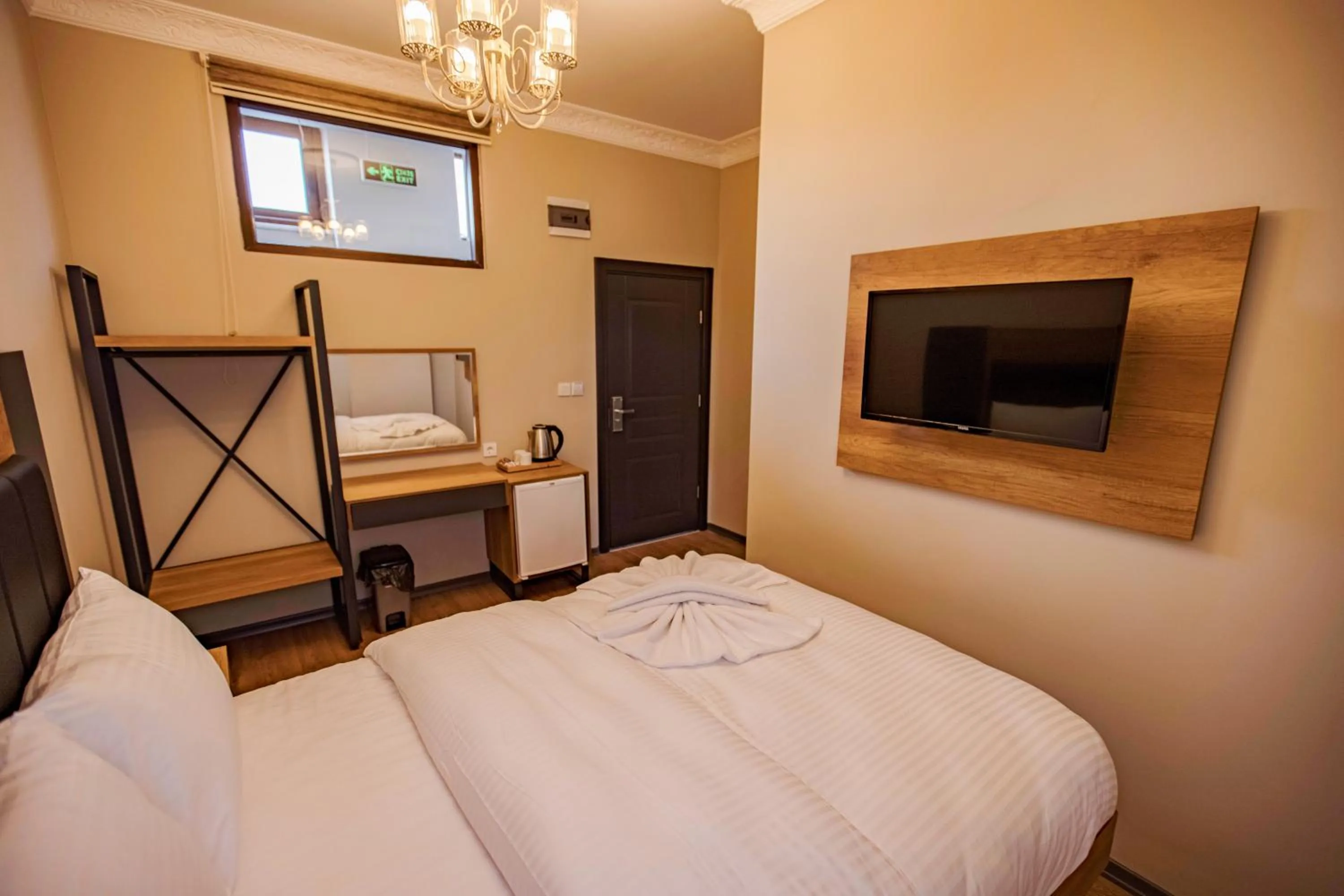 Bed in Grand Balyan Hotel & Restaurant