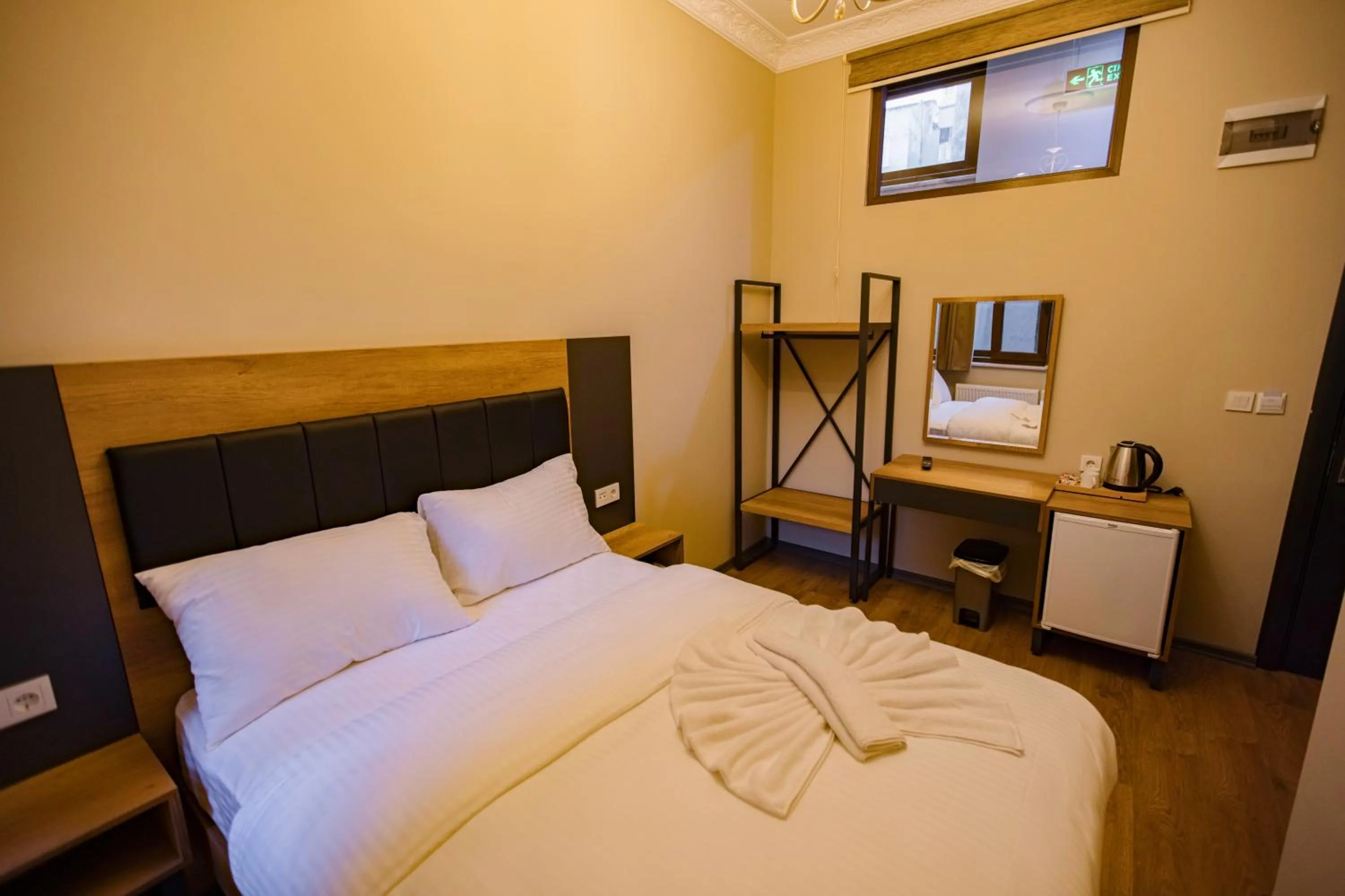 Bed in Grand Balyan Hotel & Restaurant