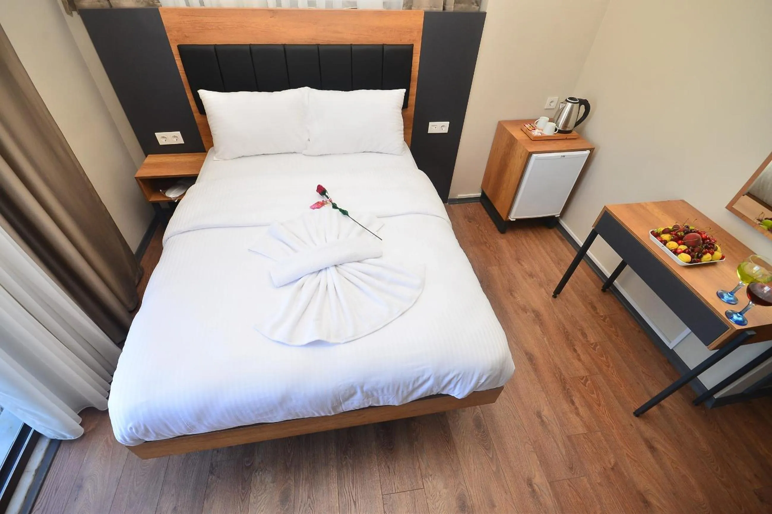 Bed in Grand Balyan Hotel & Restaurant