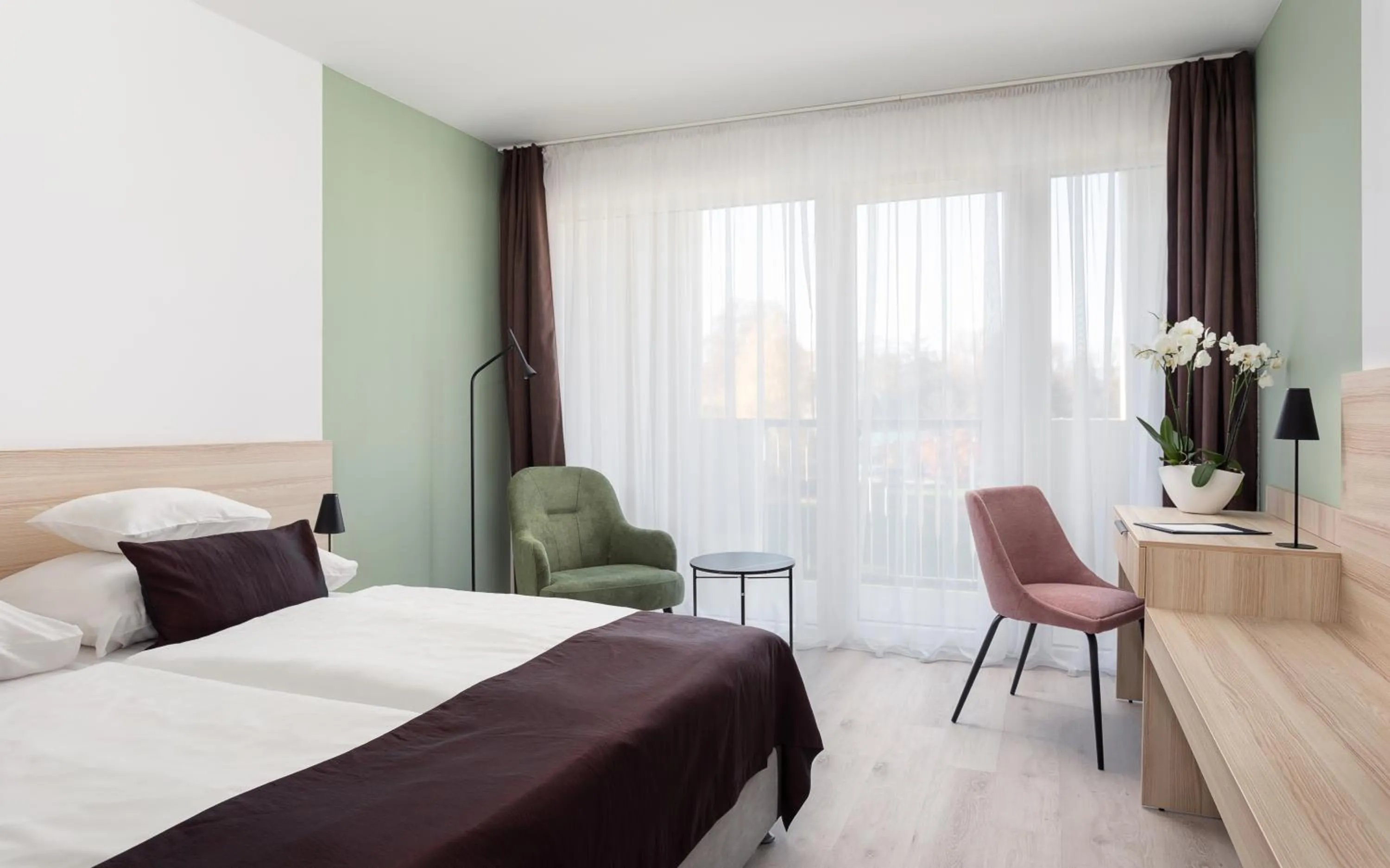 Photo of the whole room, Bed in Hunguest Hotel Flóra