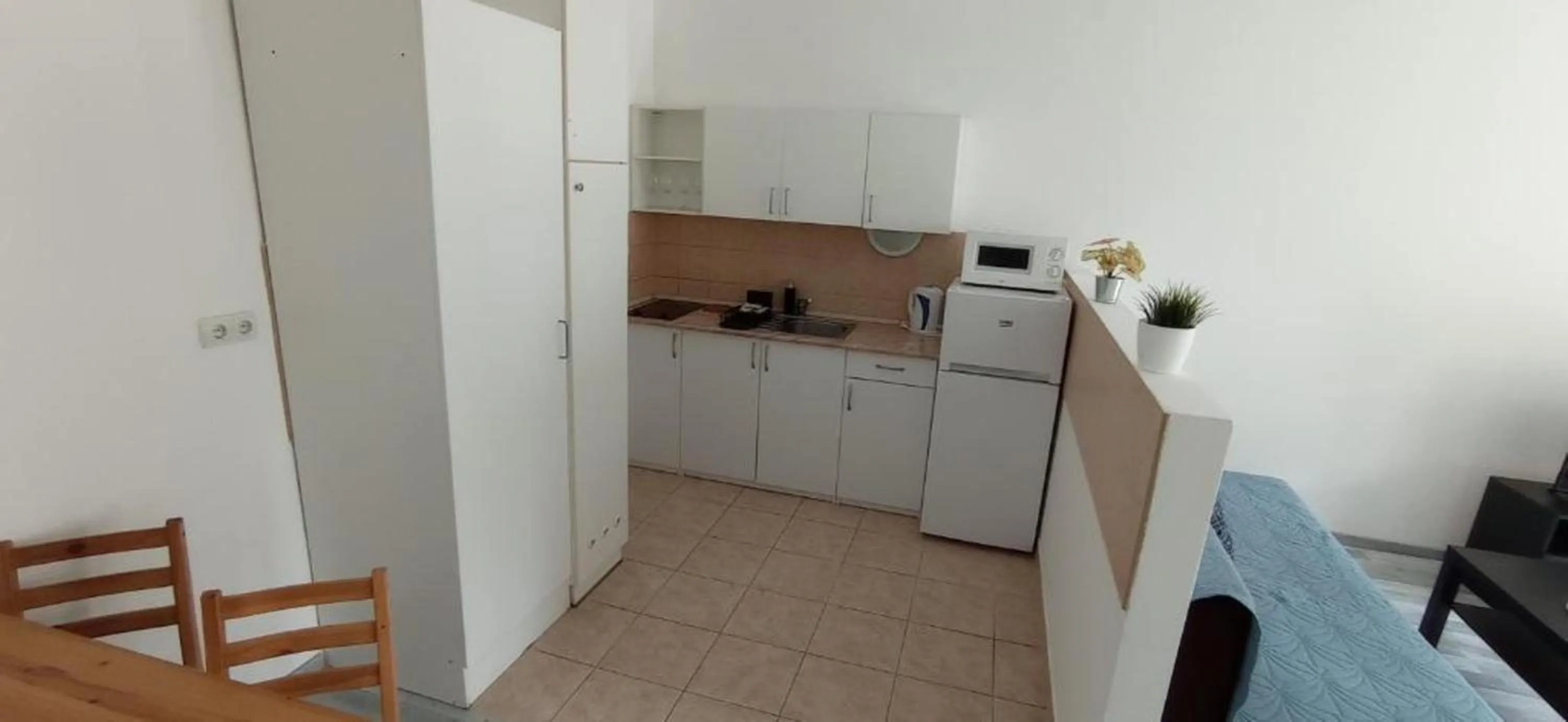 Kitchen or kitchenette in Agape Apartments