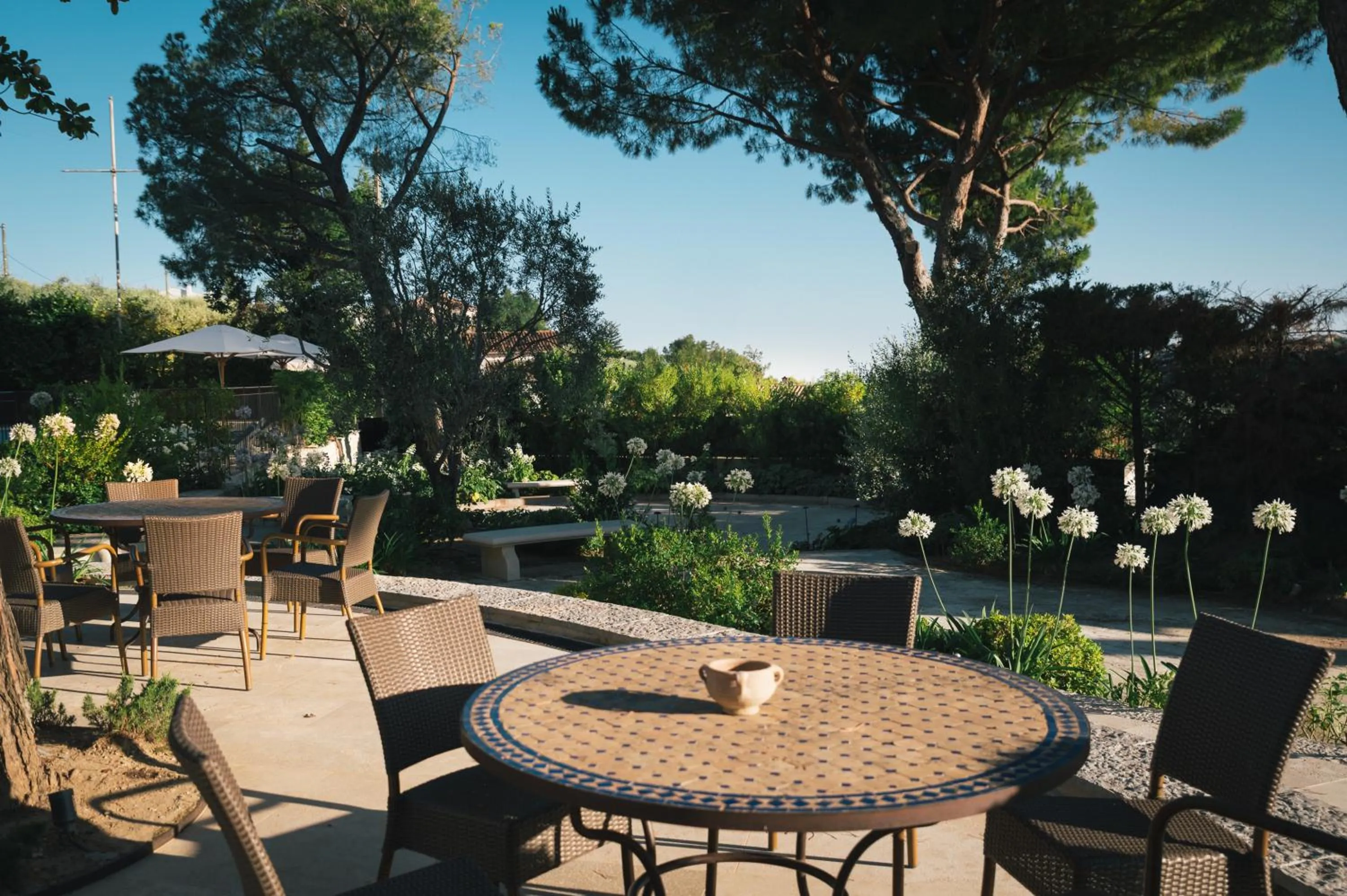 Garden in Auberge du Rédier - Logis Hôtels