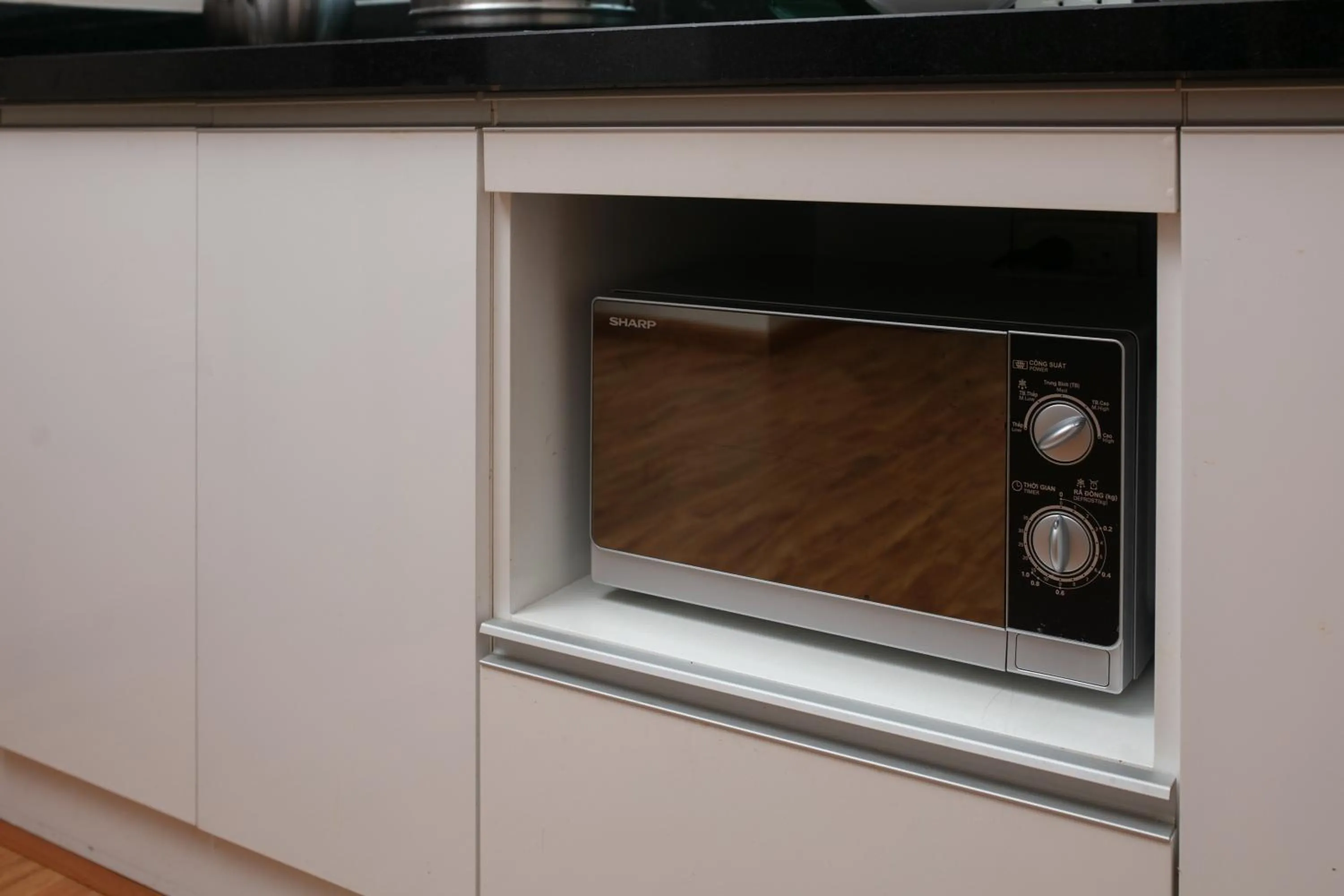 Kitchen or kitchenette in HB Serviced Apartment - 12 Trần Quý Kiên