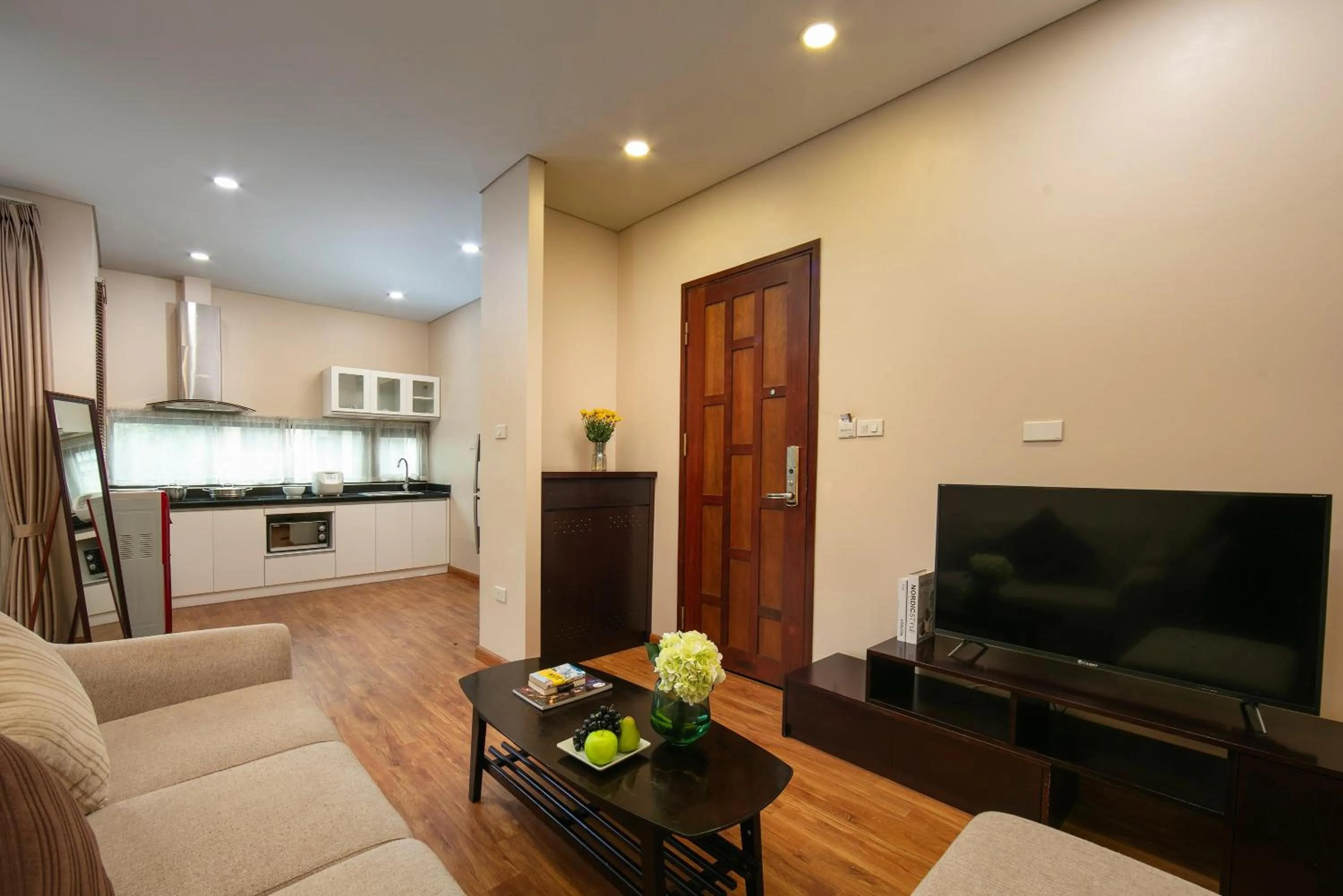 Communal lounge/ TV room in HB Serviced Apartment - 12 Trần Quý Kiên