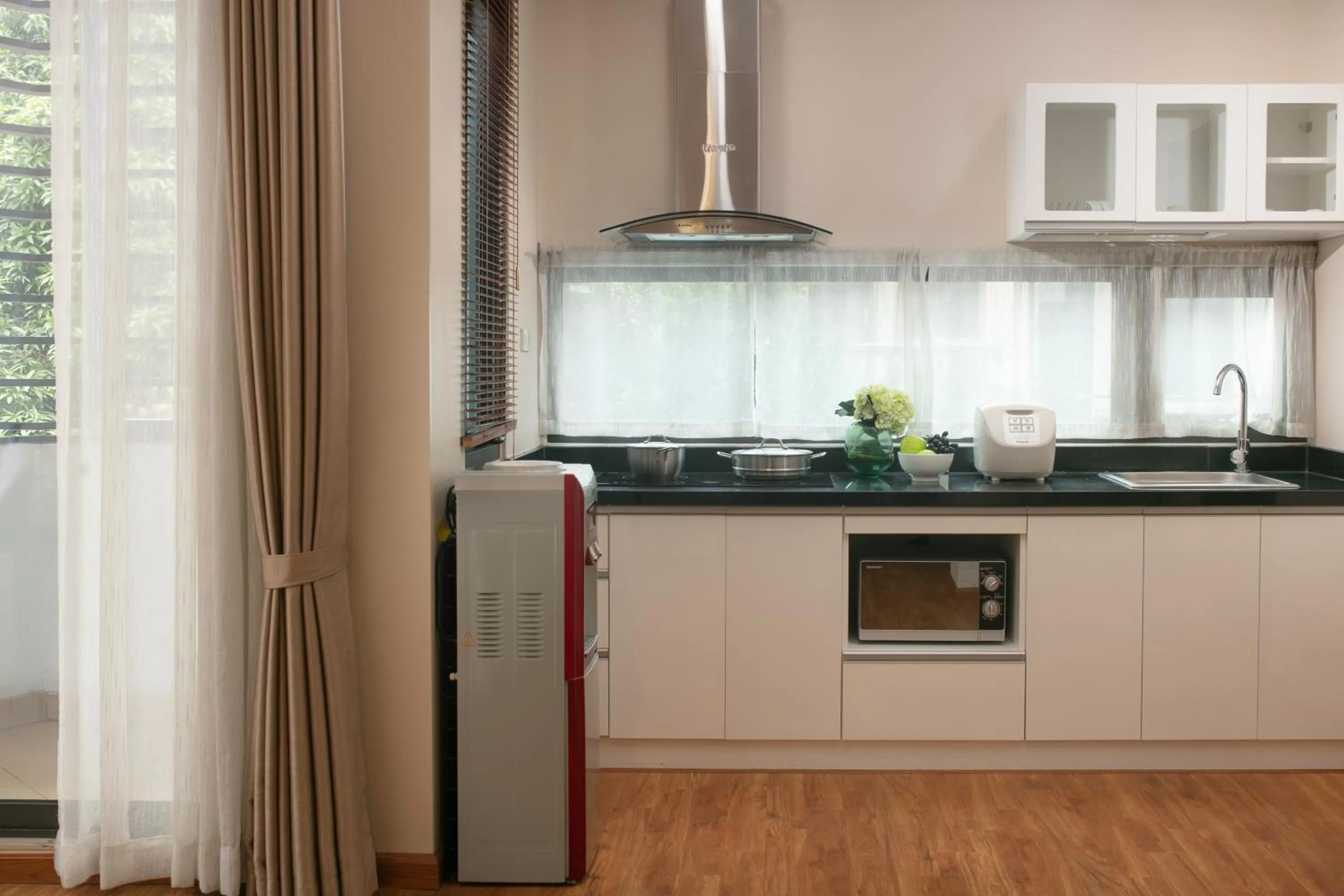 Kitchen or kitchenette in HB Serviced Apartment - 12 Trần Quý Kiên