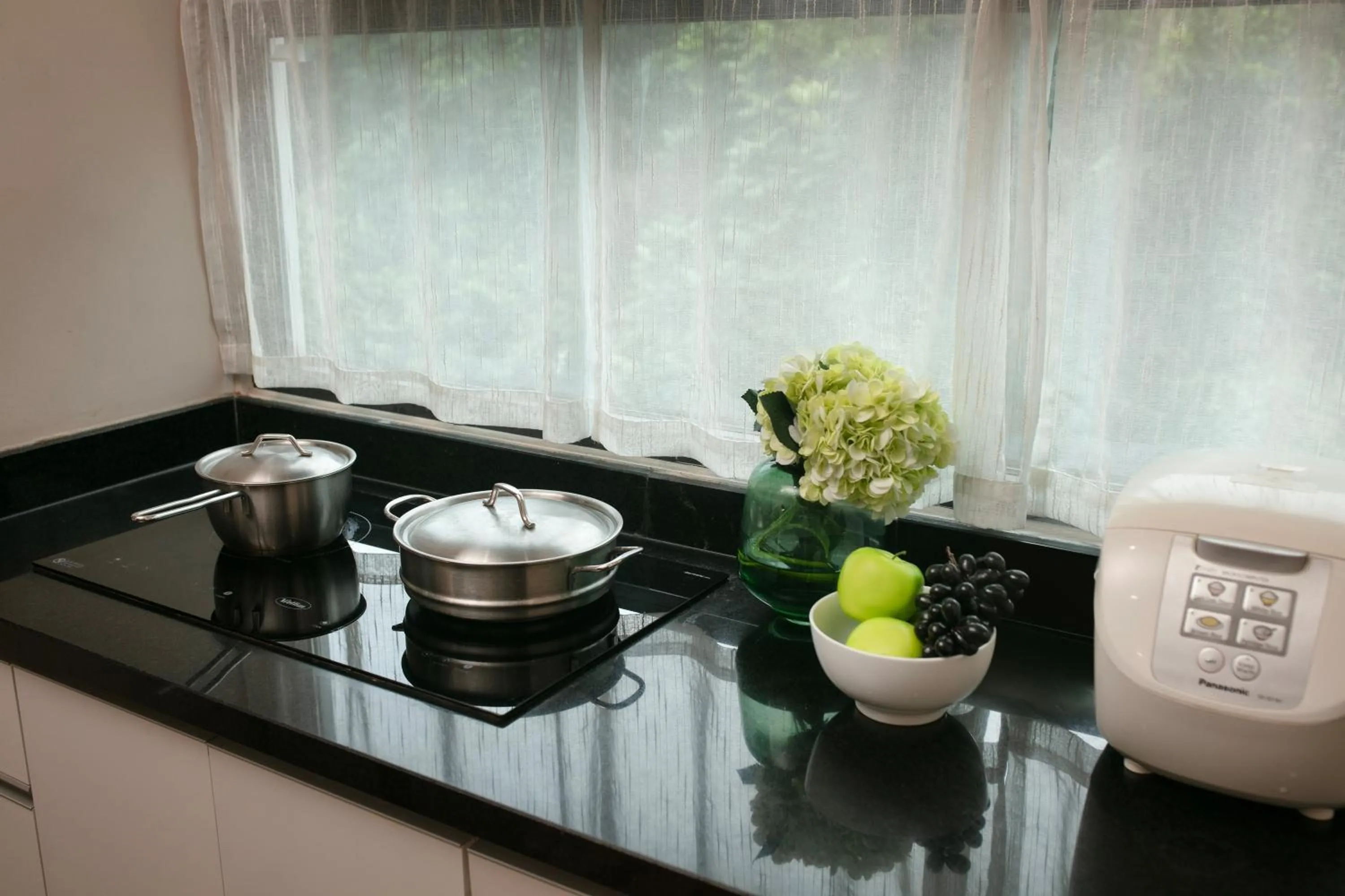 Kitchen or kitchenette in HB Serviced Apartment - 12 Trần Quý Kiên