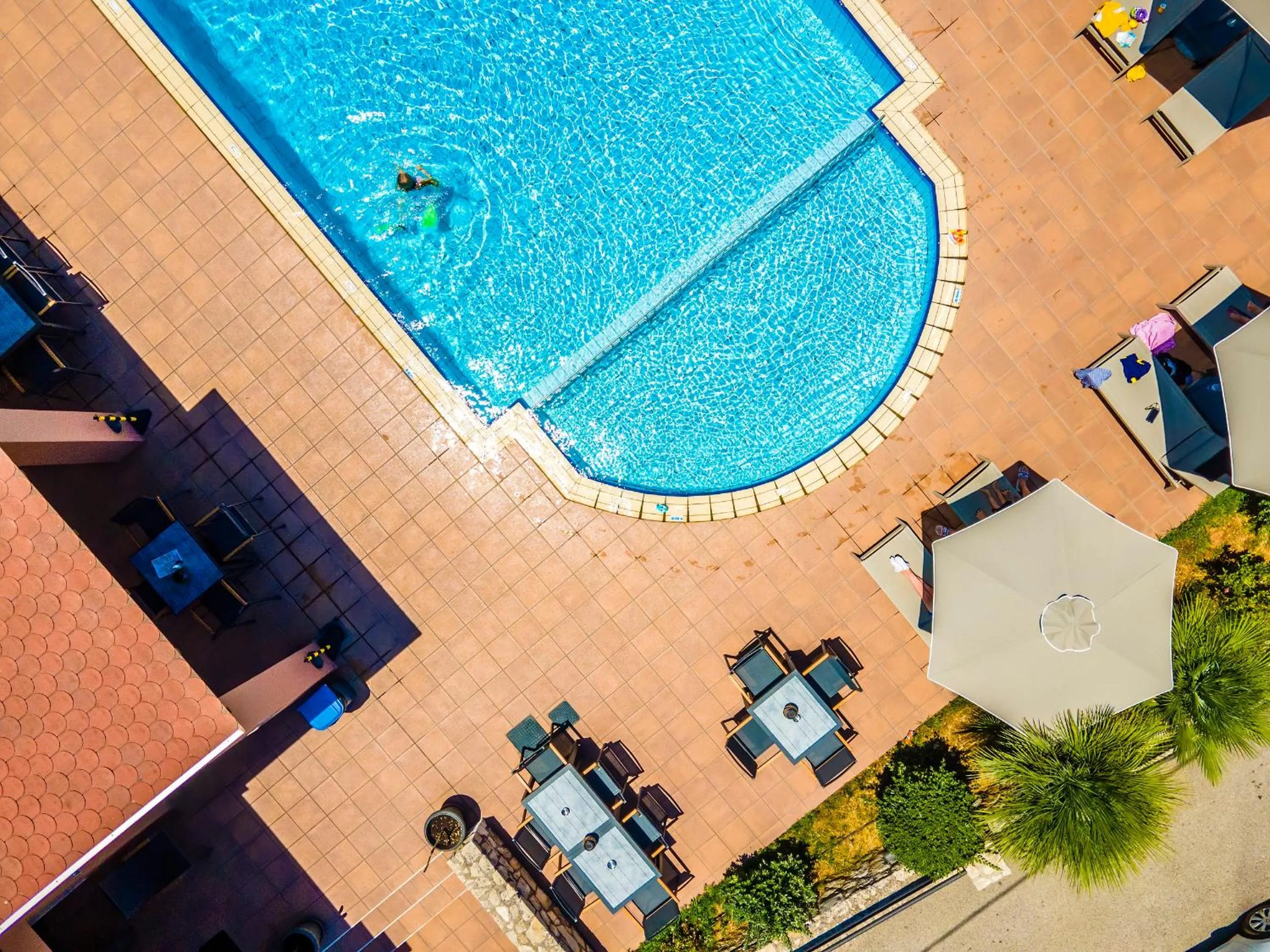 Swimming pool in Theos Holidays Apartments