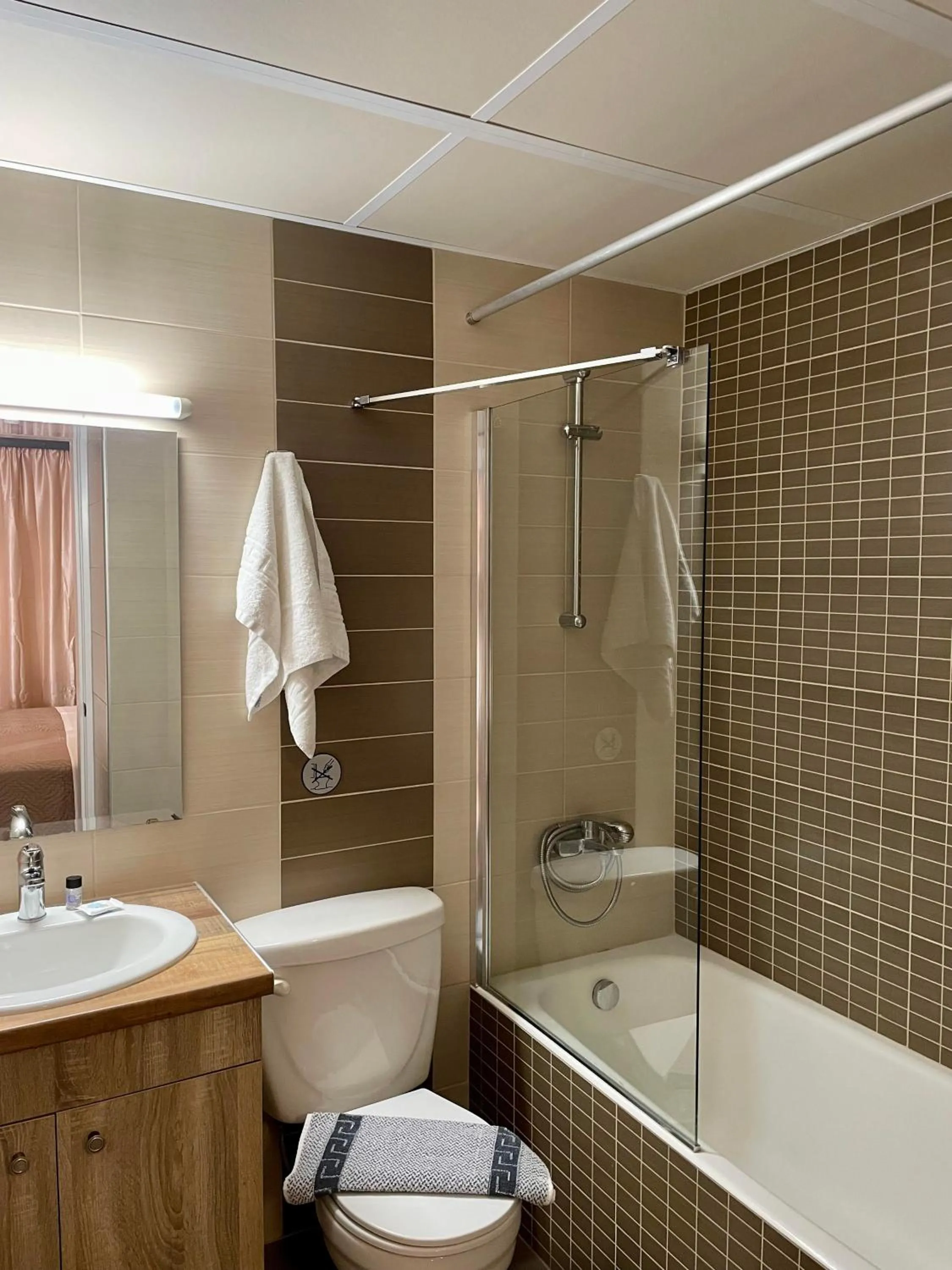 Bathroom in Theos Holidays Apartments