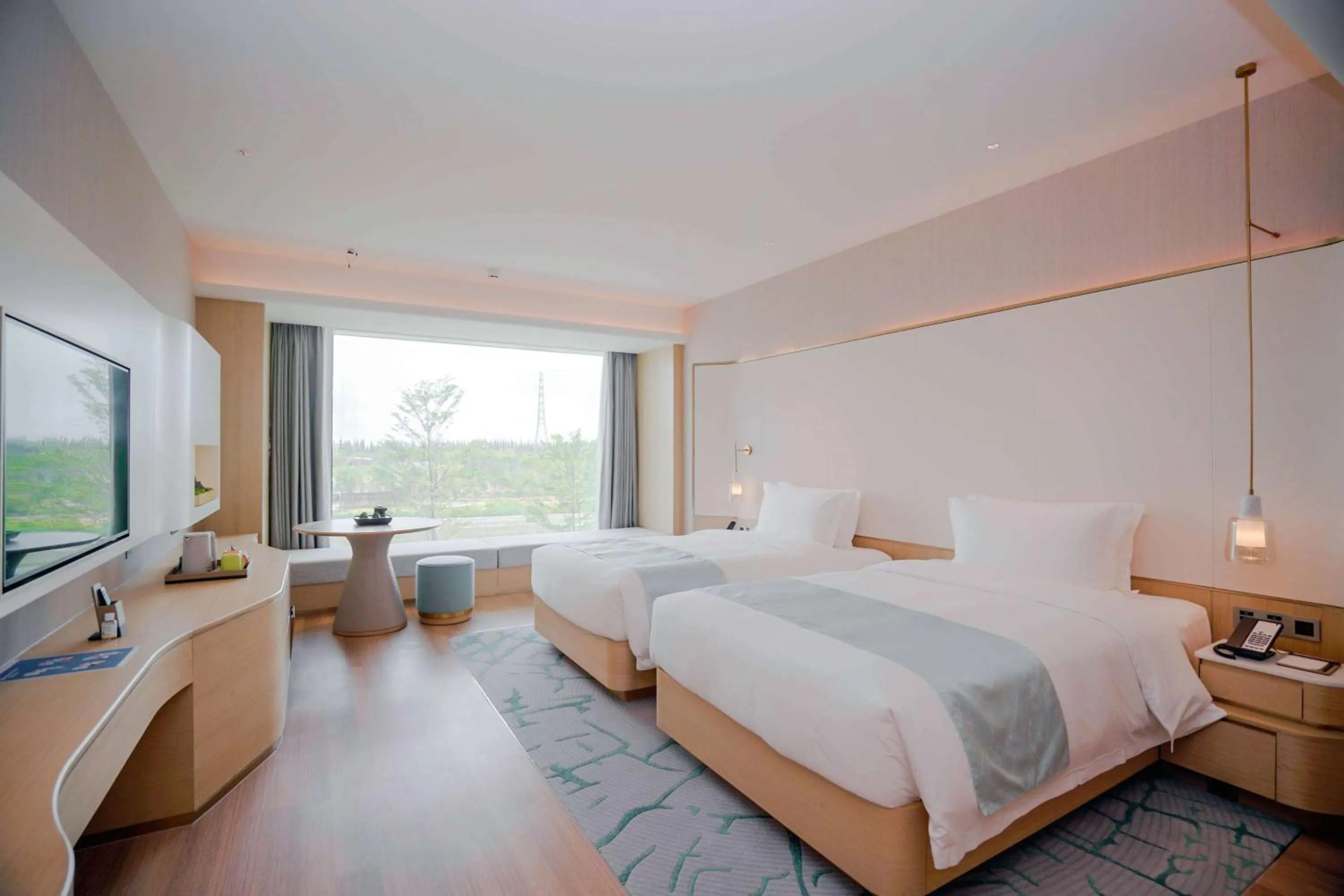 Photo of the whole room, Bed in Wyndham Garden Jinjiang