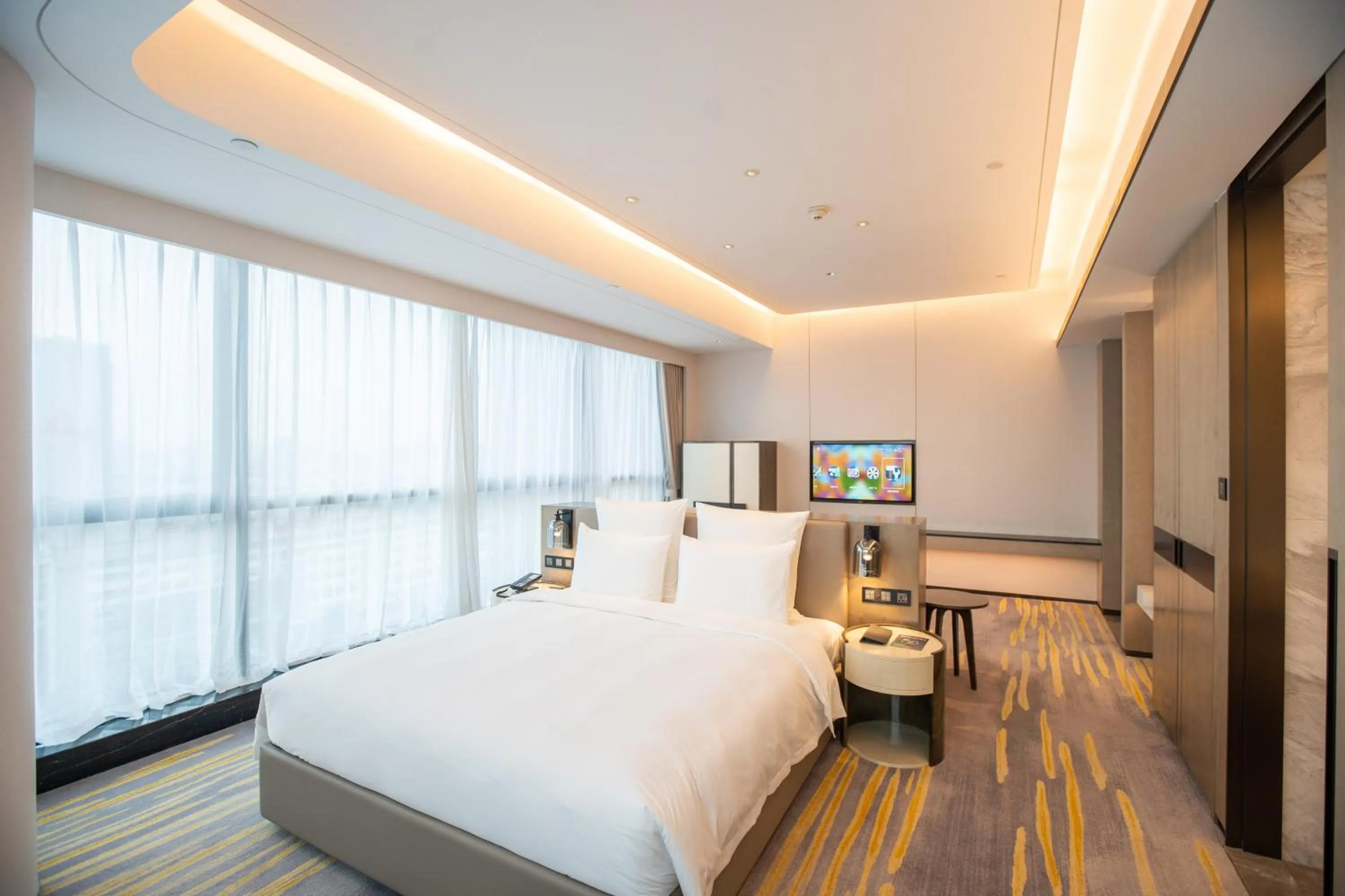 Bed in Pullman Suzhou Zhonghui