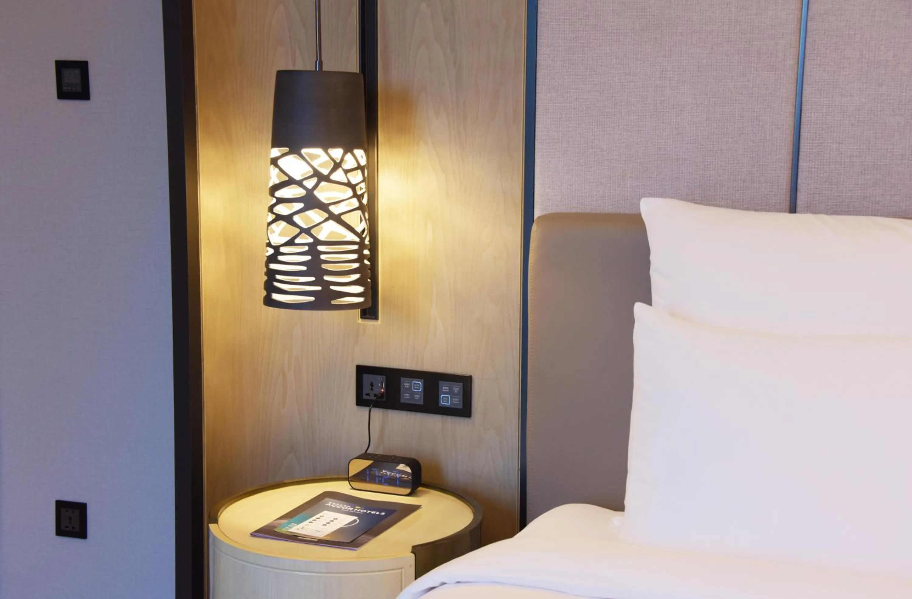 Bed in Pullman Suzhou Zhonghui