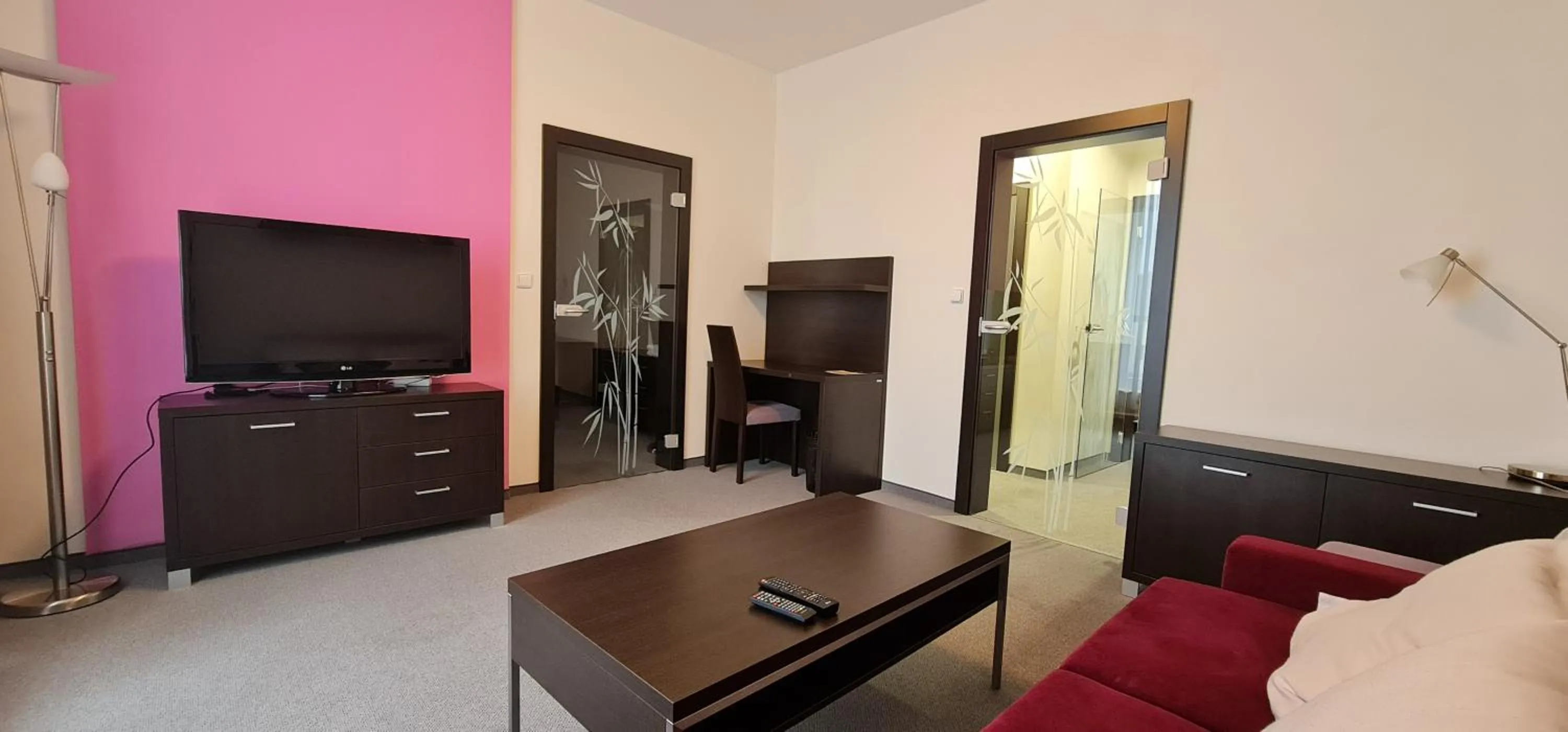 Living room, Bed in Hotel Berounka