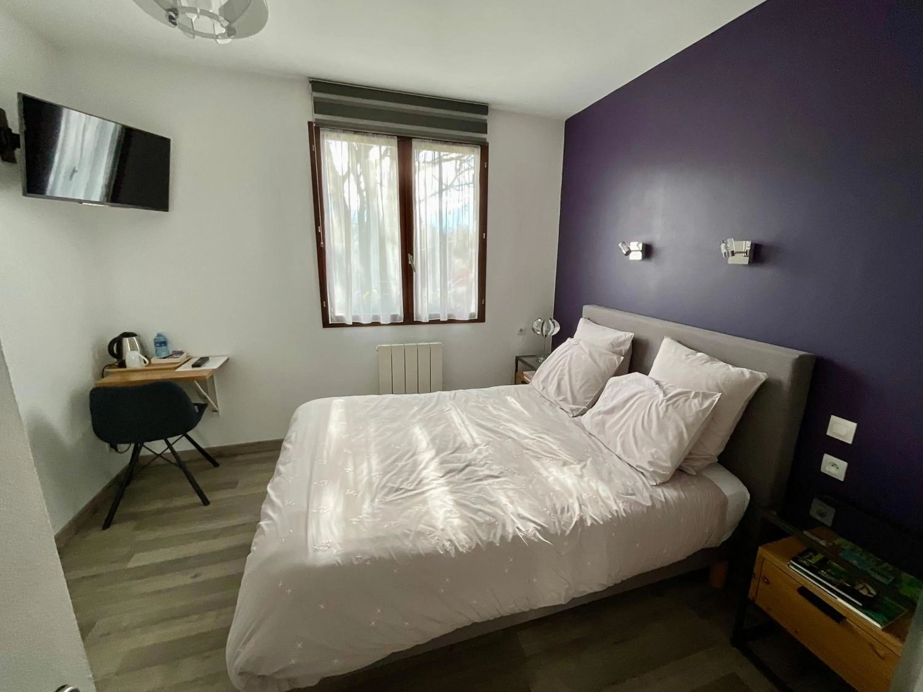 Bed in Chambres tout confort du Tilleul