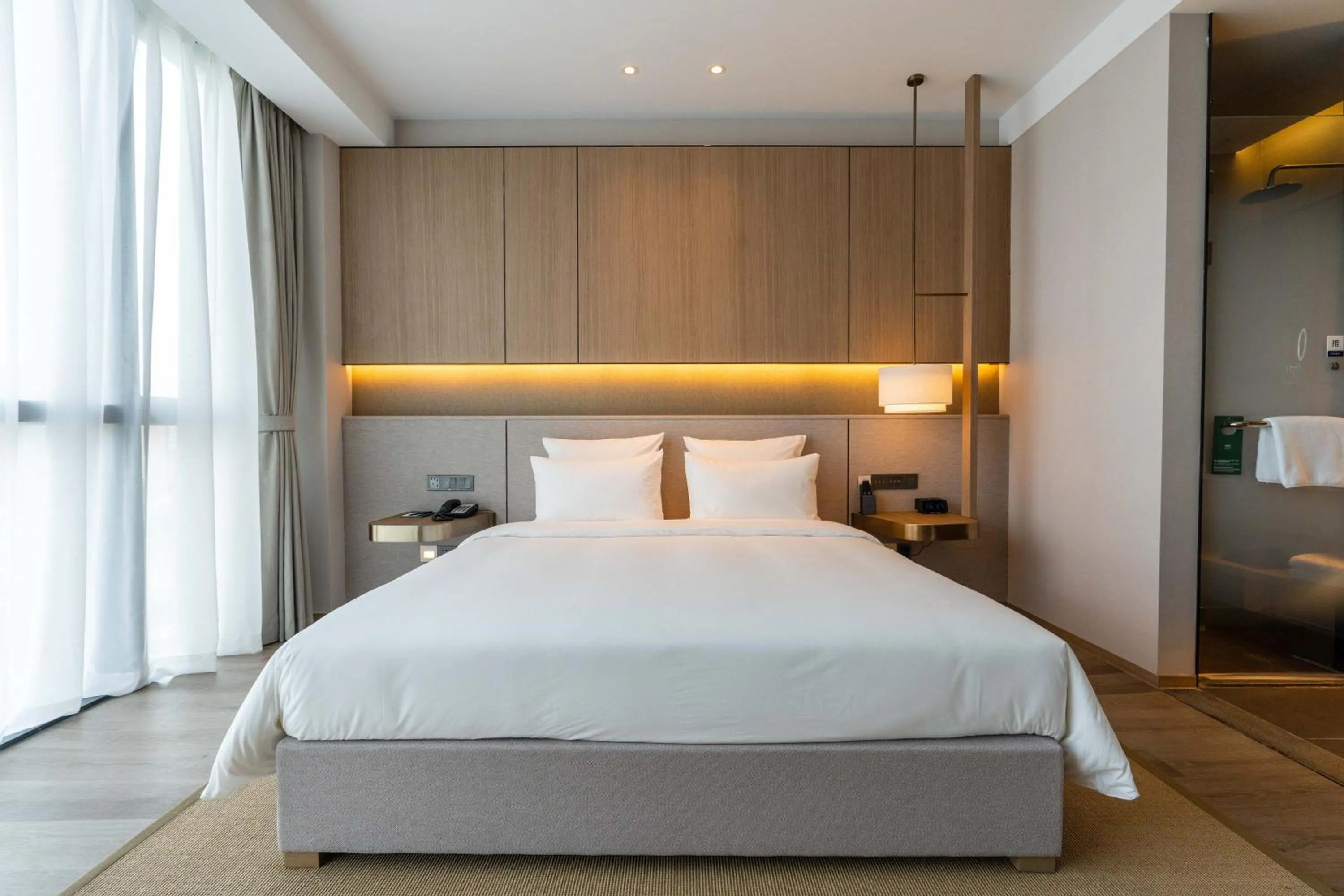 Bed in Novotel Shanghai Qingpu Excellence