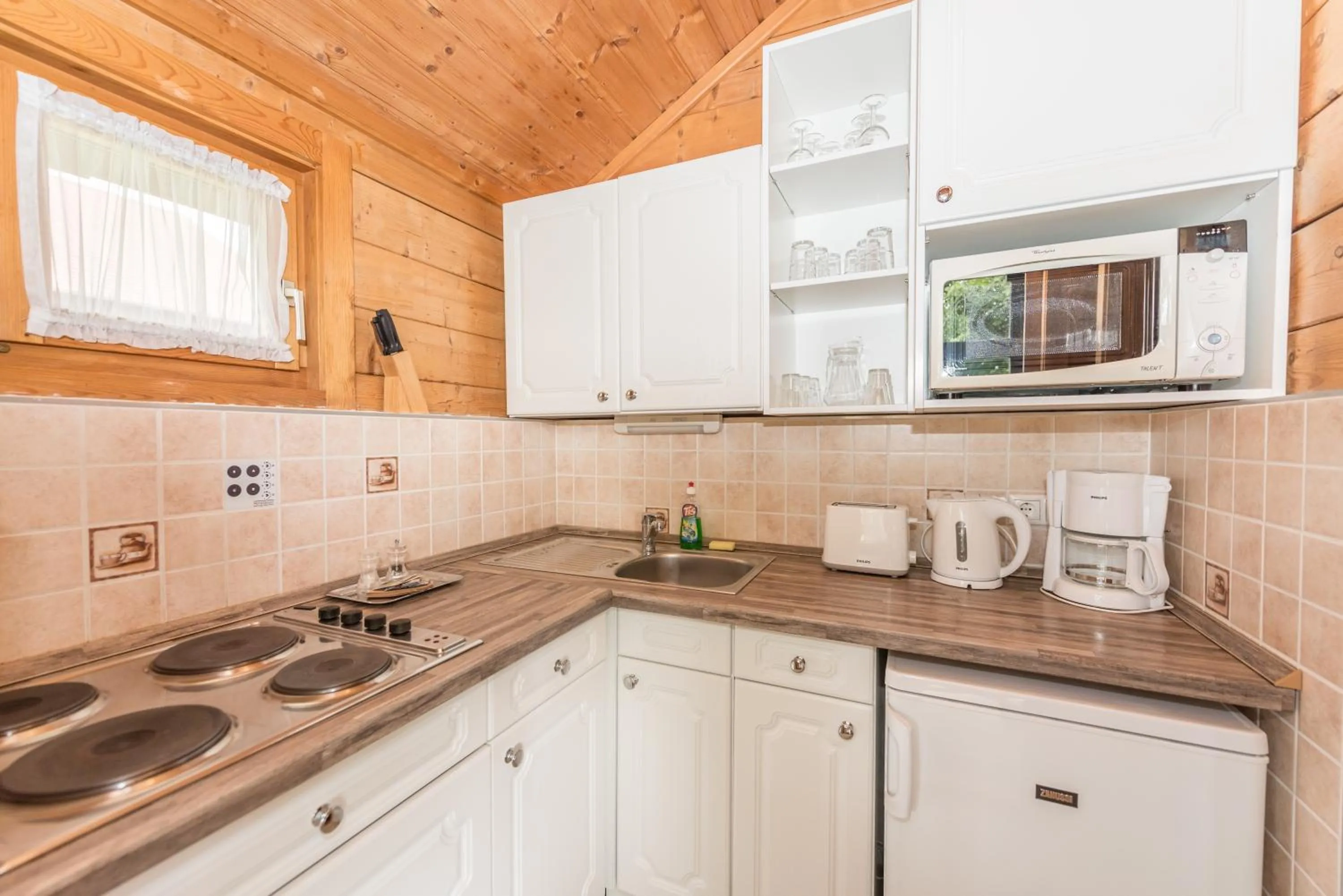 Kitchen or kitchenette in Petneházy Aparthotel