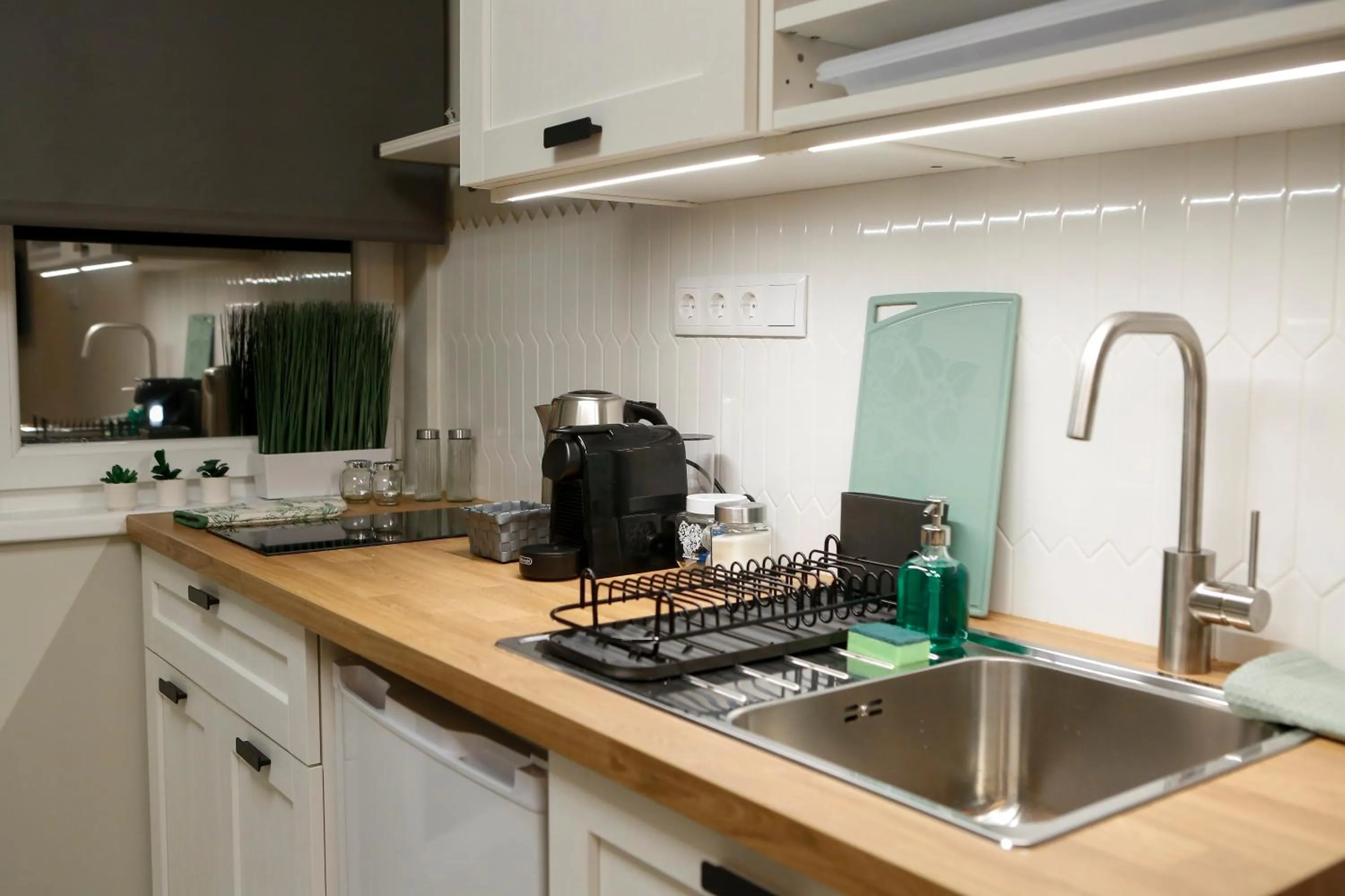 Kitchen or kitchenette in Akacfa Holiday Apartments
