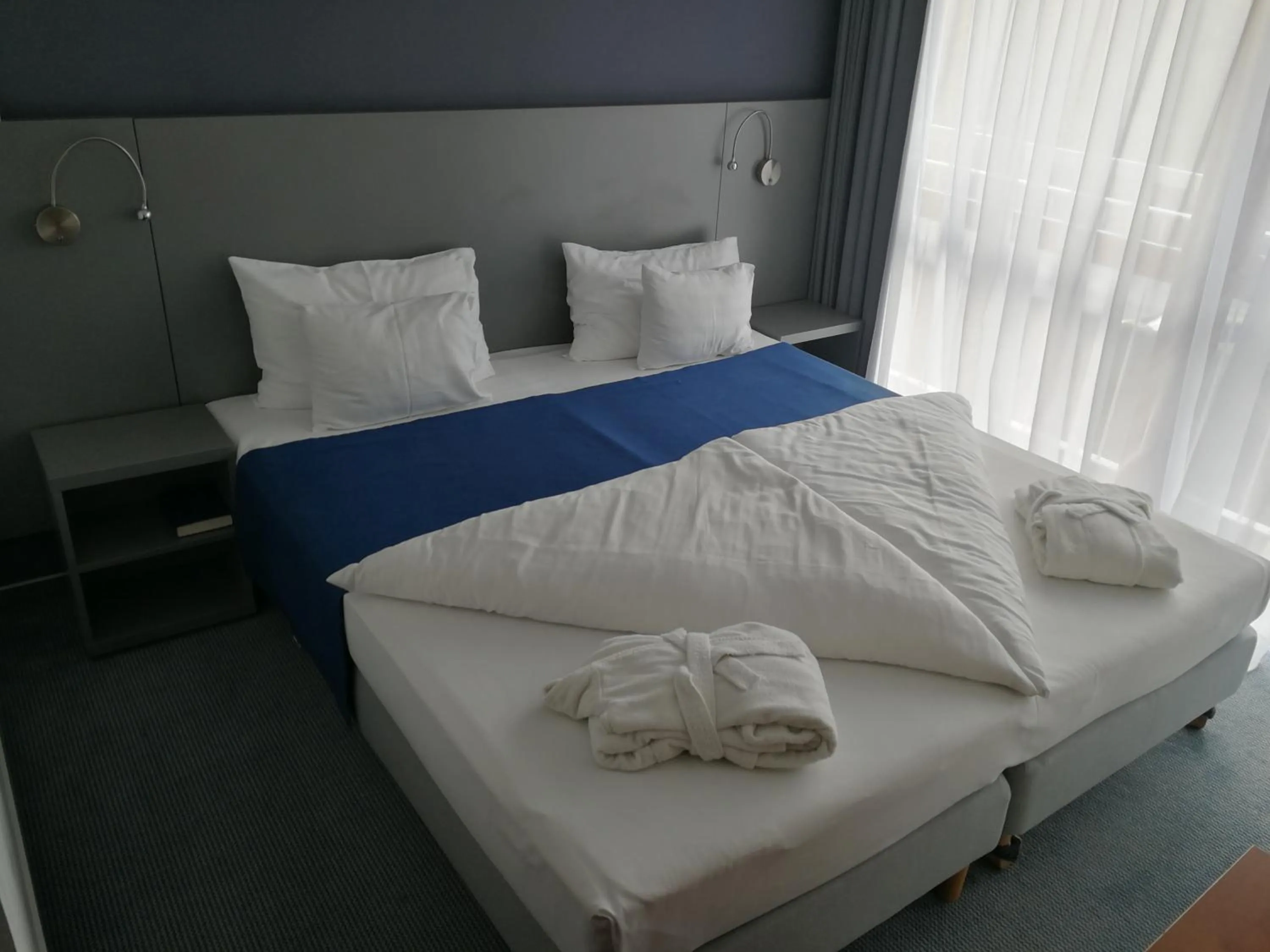 Bed in Hotel Yacht Wellness & Business