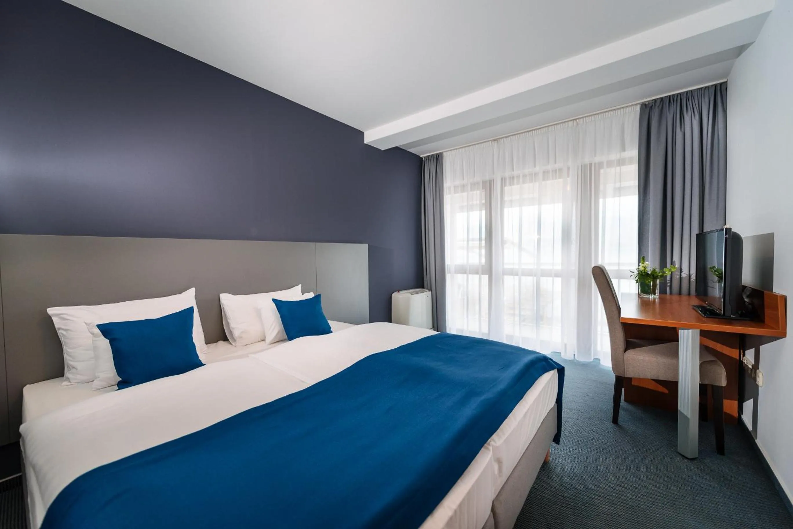 Bed in Hotel Yacht Wellness & Business