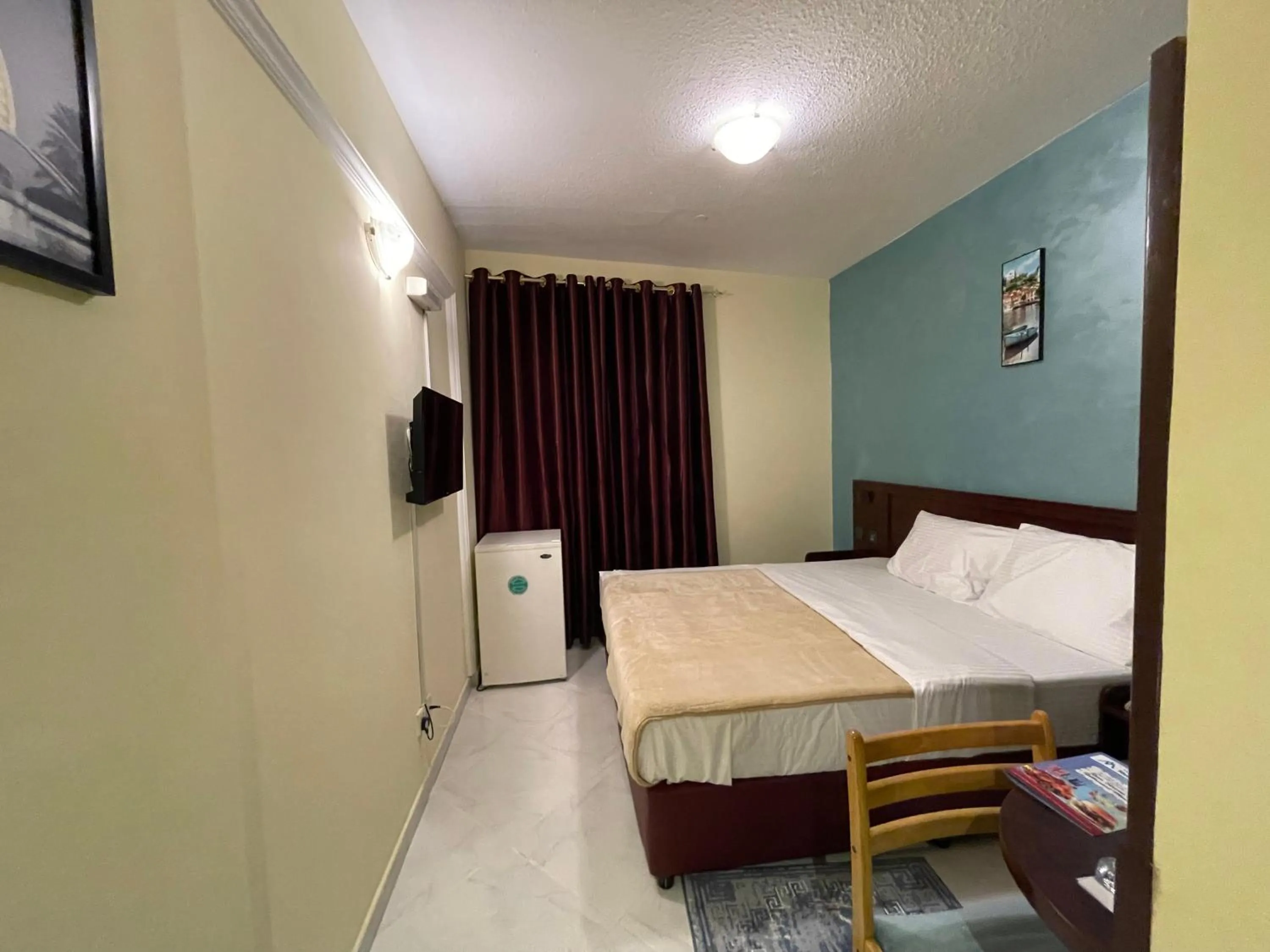 Photo of the whole room, Bed in MOUNT SINA HOTEL By AURA