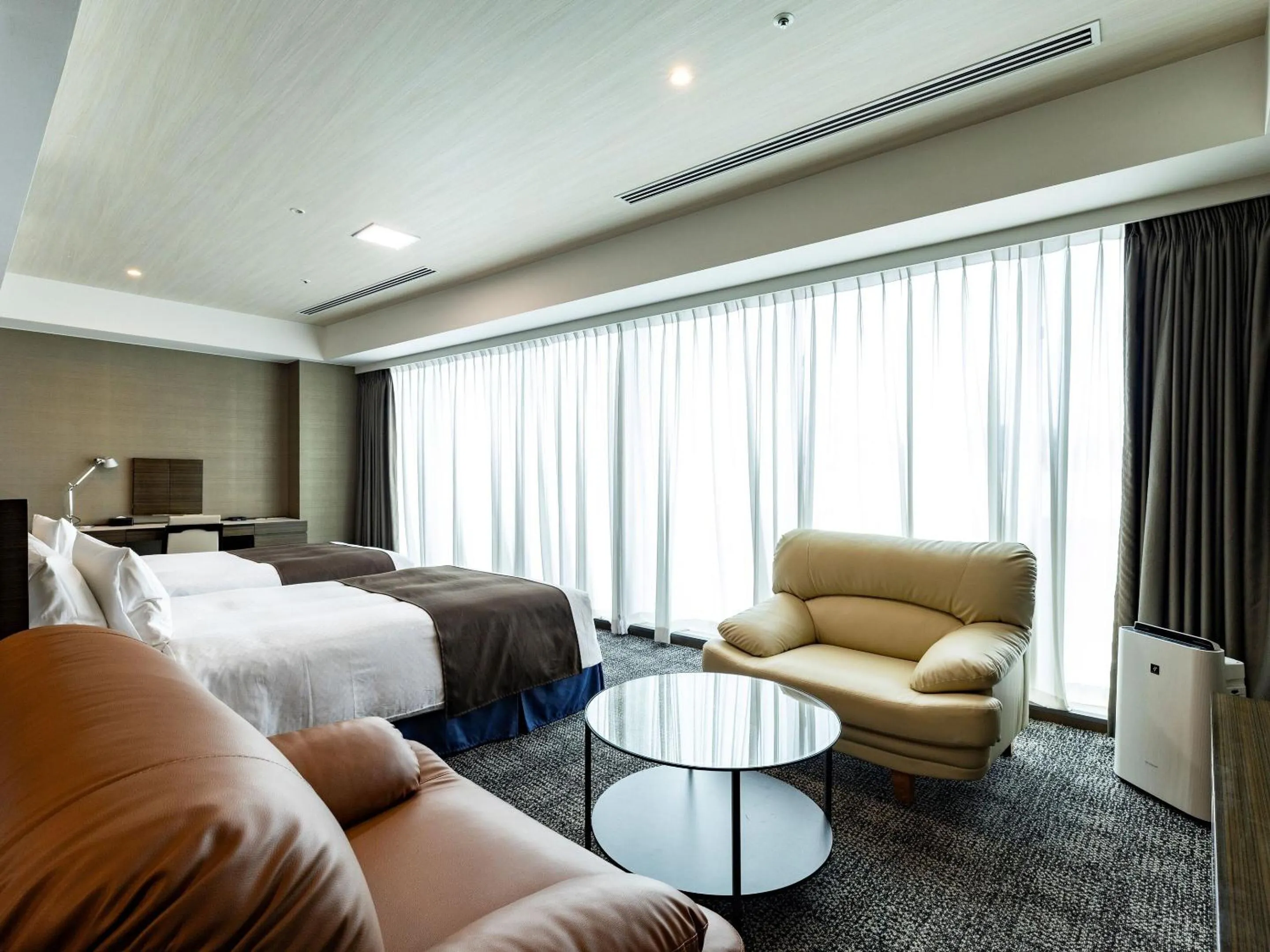 Photo of the whole room, Bed in KOKO HOTEL Premier Hakata - formerly Tenza Hotel at Hakata Station