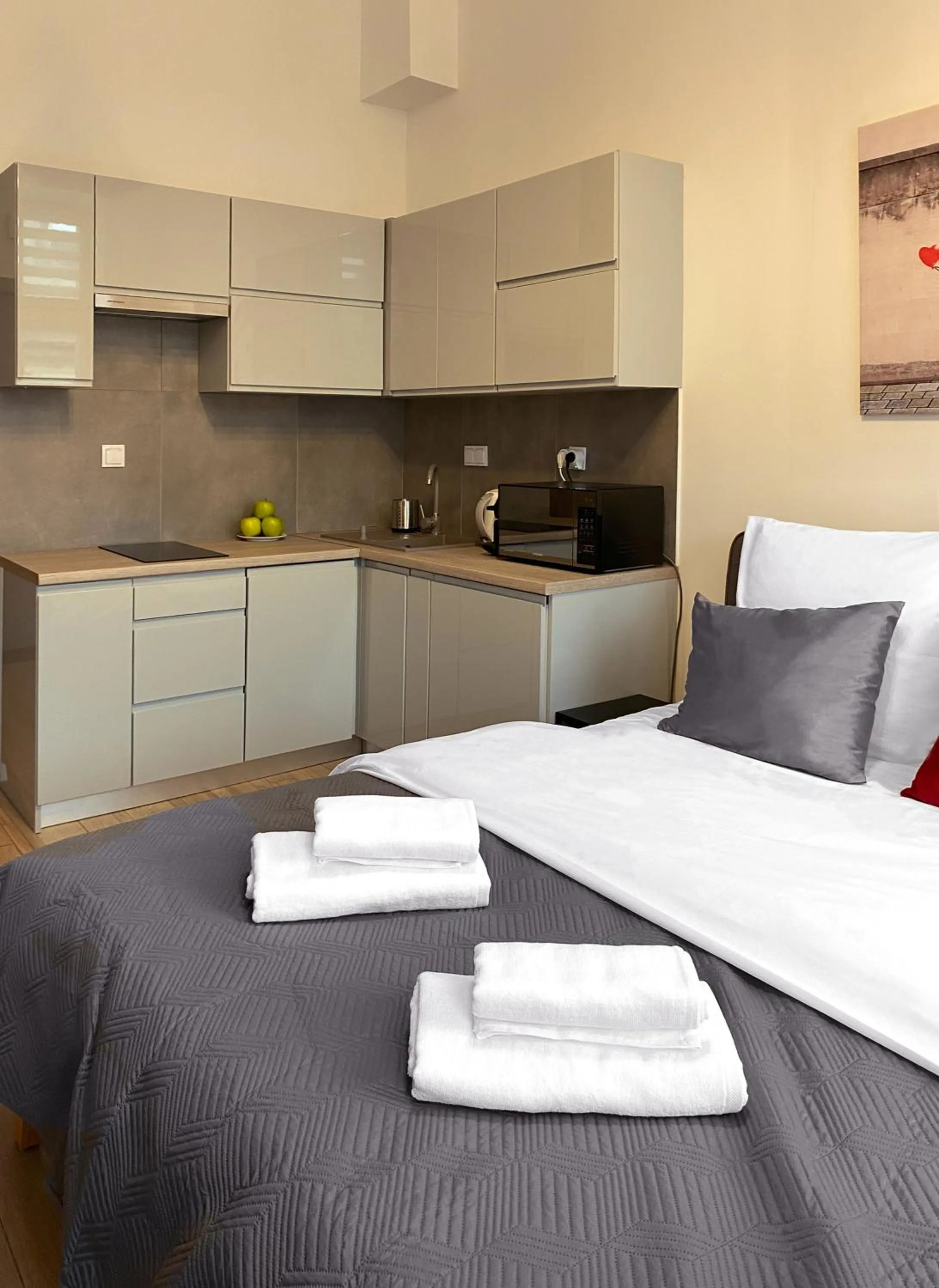 Kitchen or kitchenette, Bed in Starowiślna 41-43 by PI Apartments