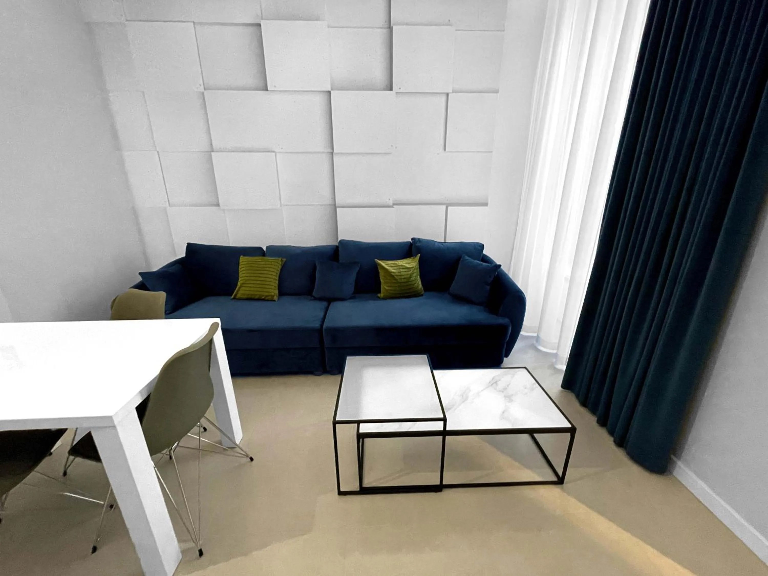 Seating area in Starowiślna 41-43 by PI Apartments