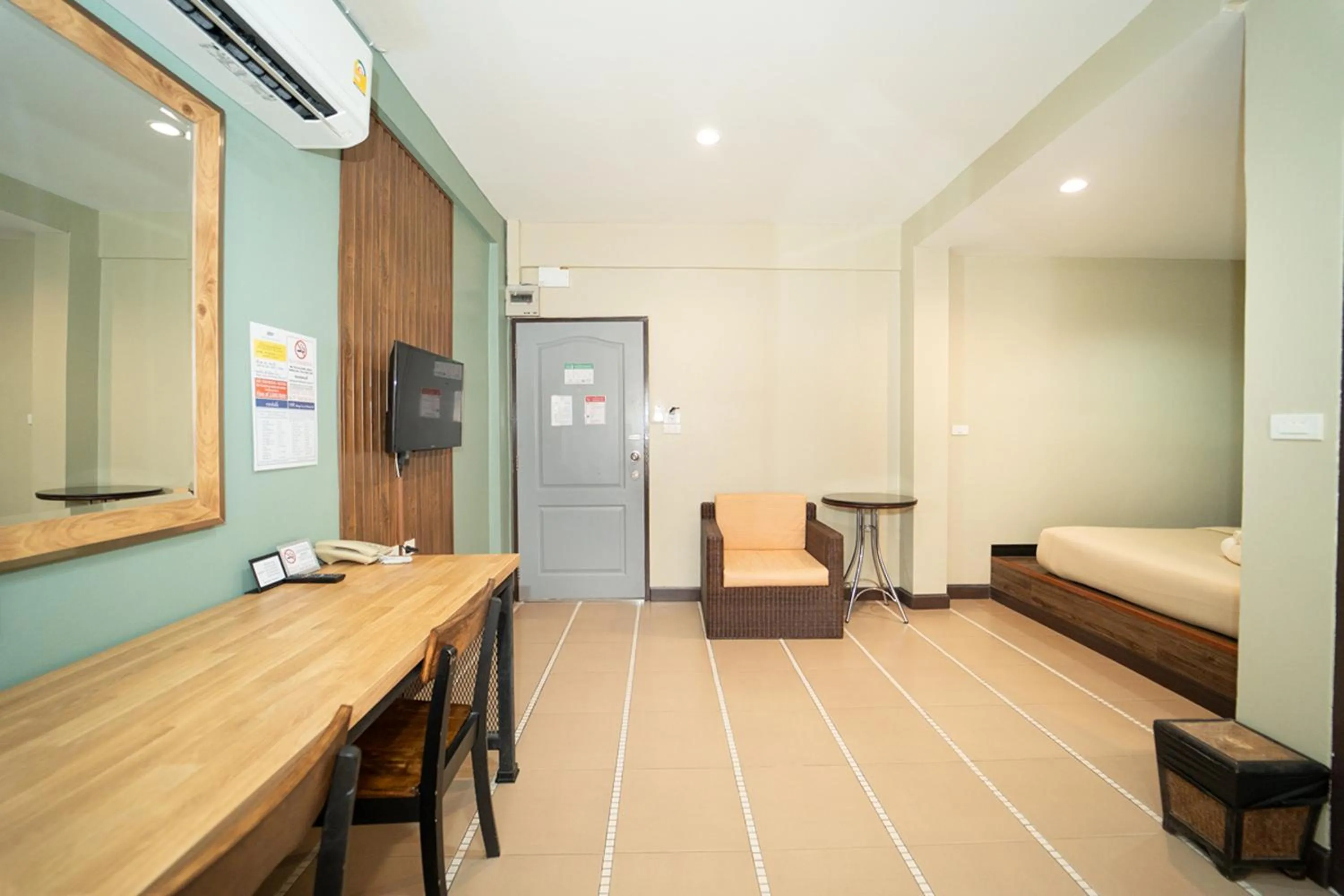 Bed in The Palm Hotel