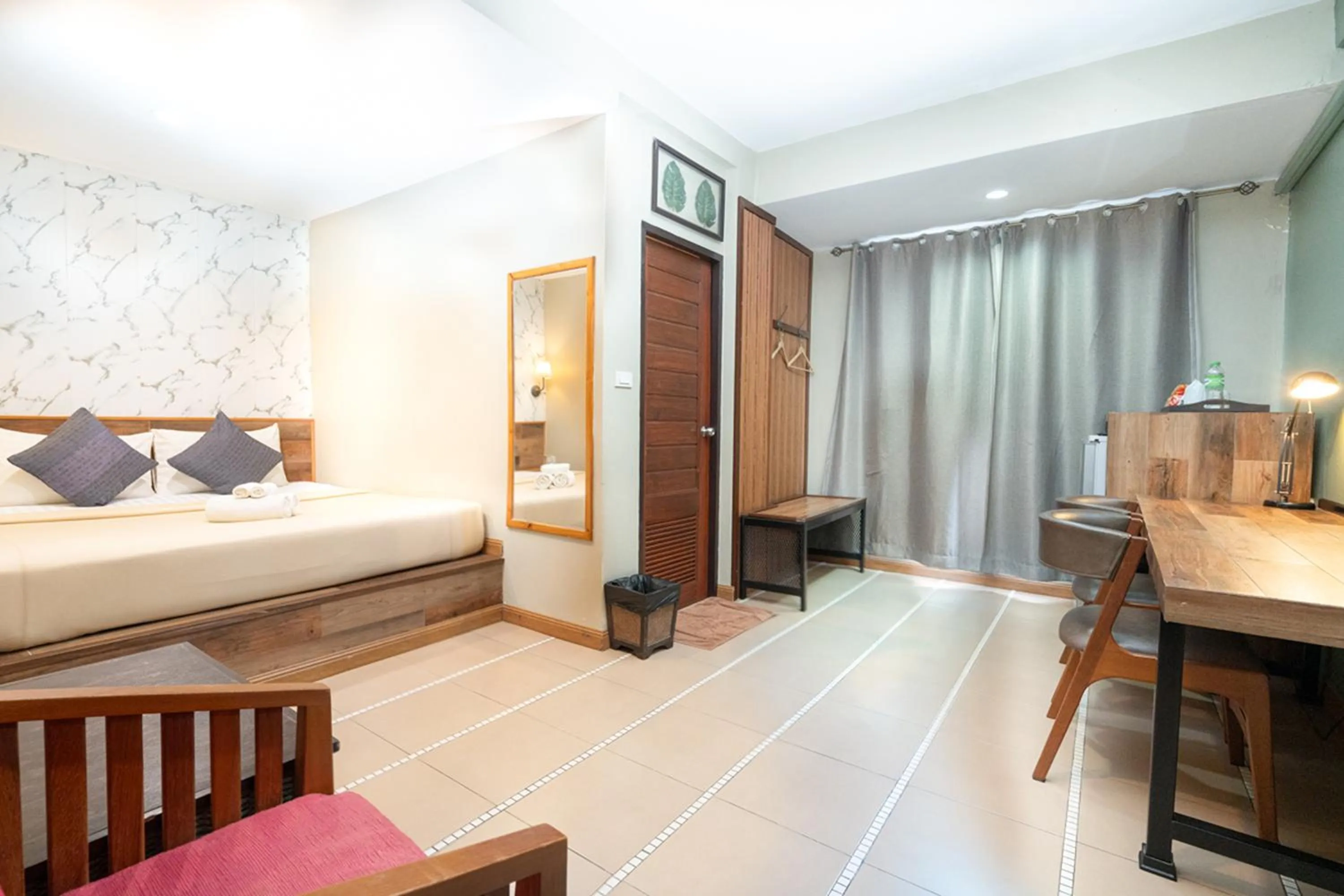 Bed in The Palm Hotel