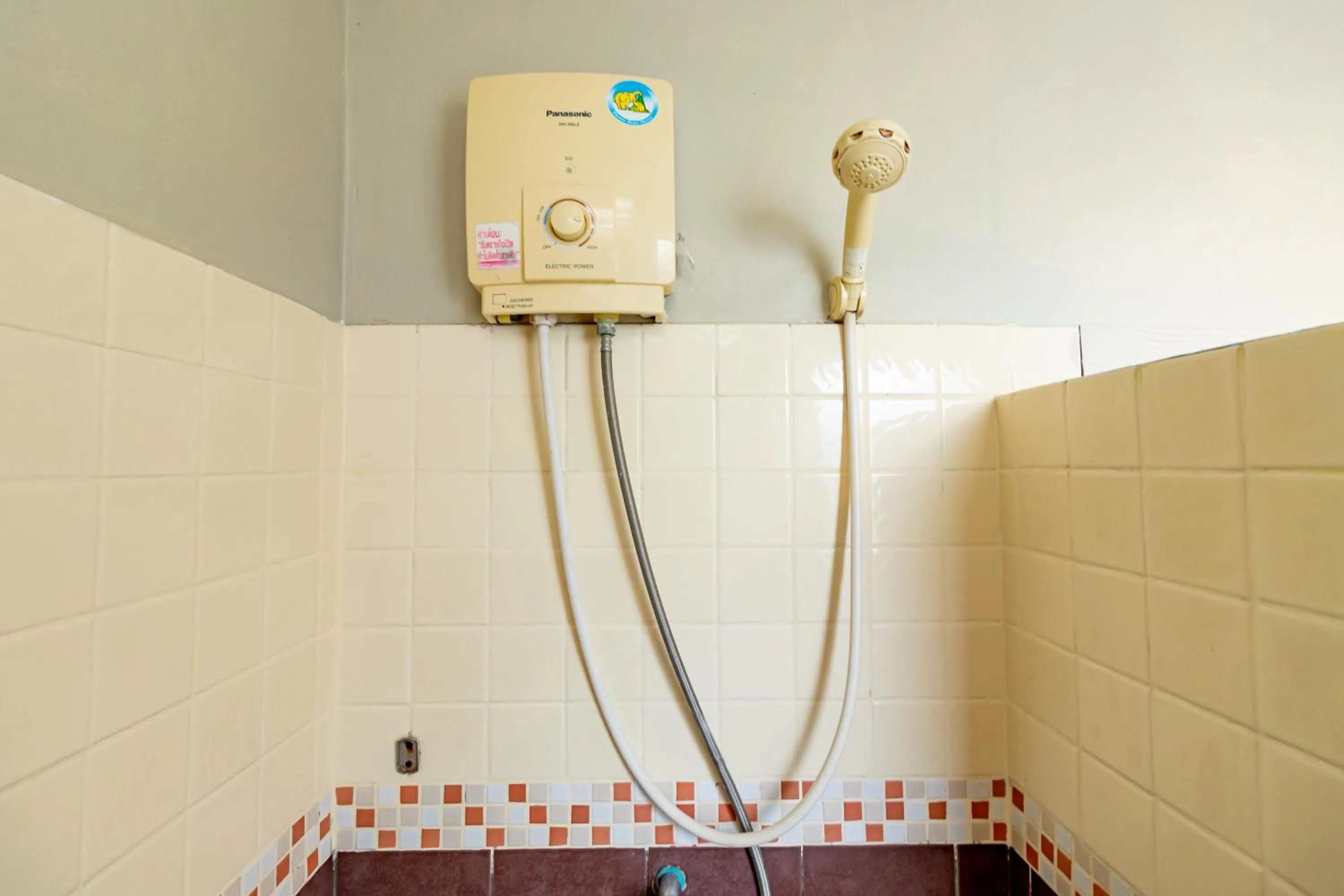 Shower in The Palm Hotel