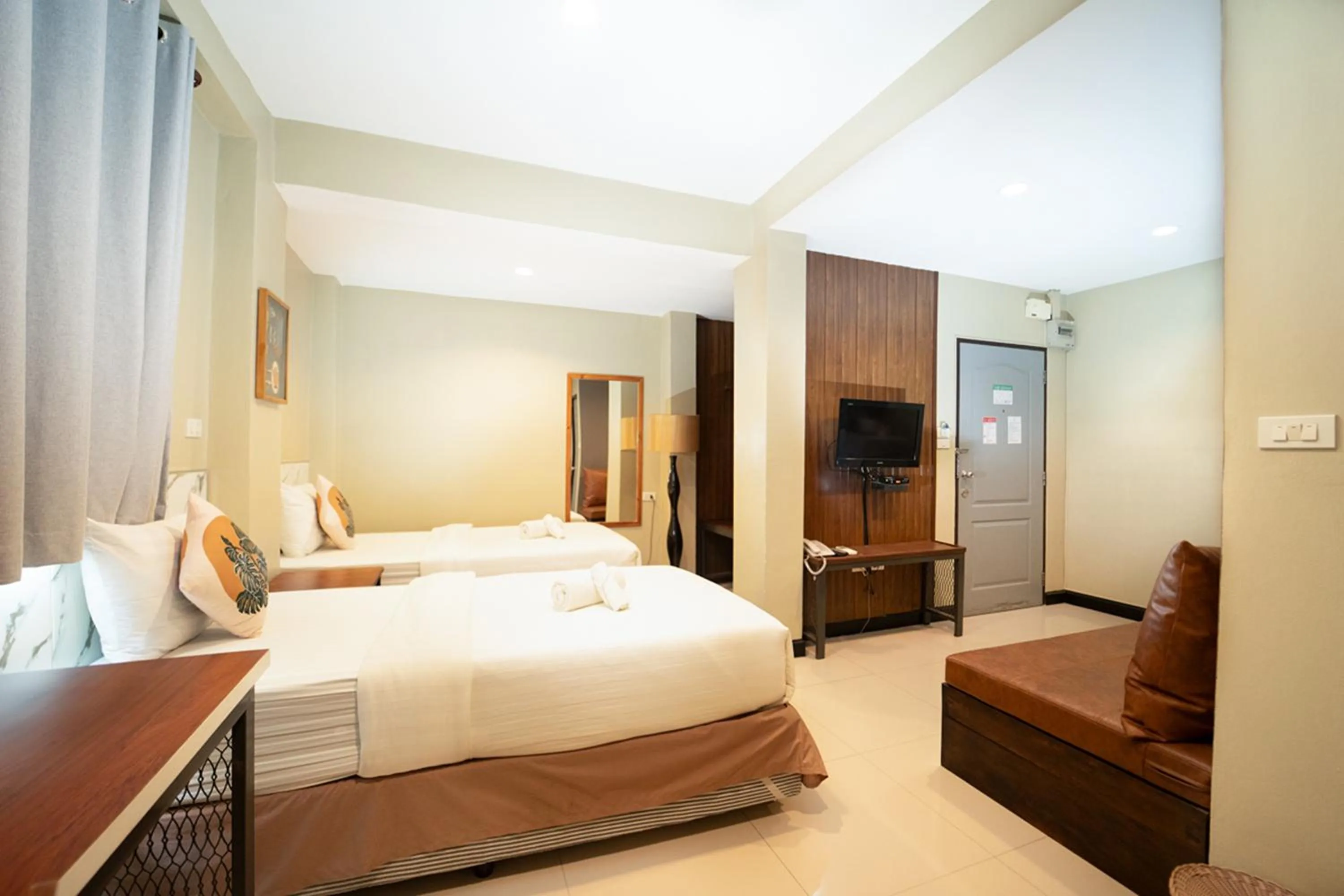 Bed in The Palm Hotel