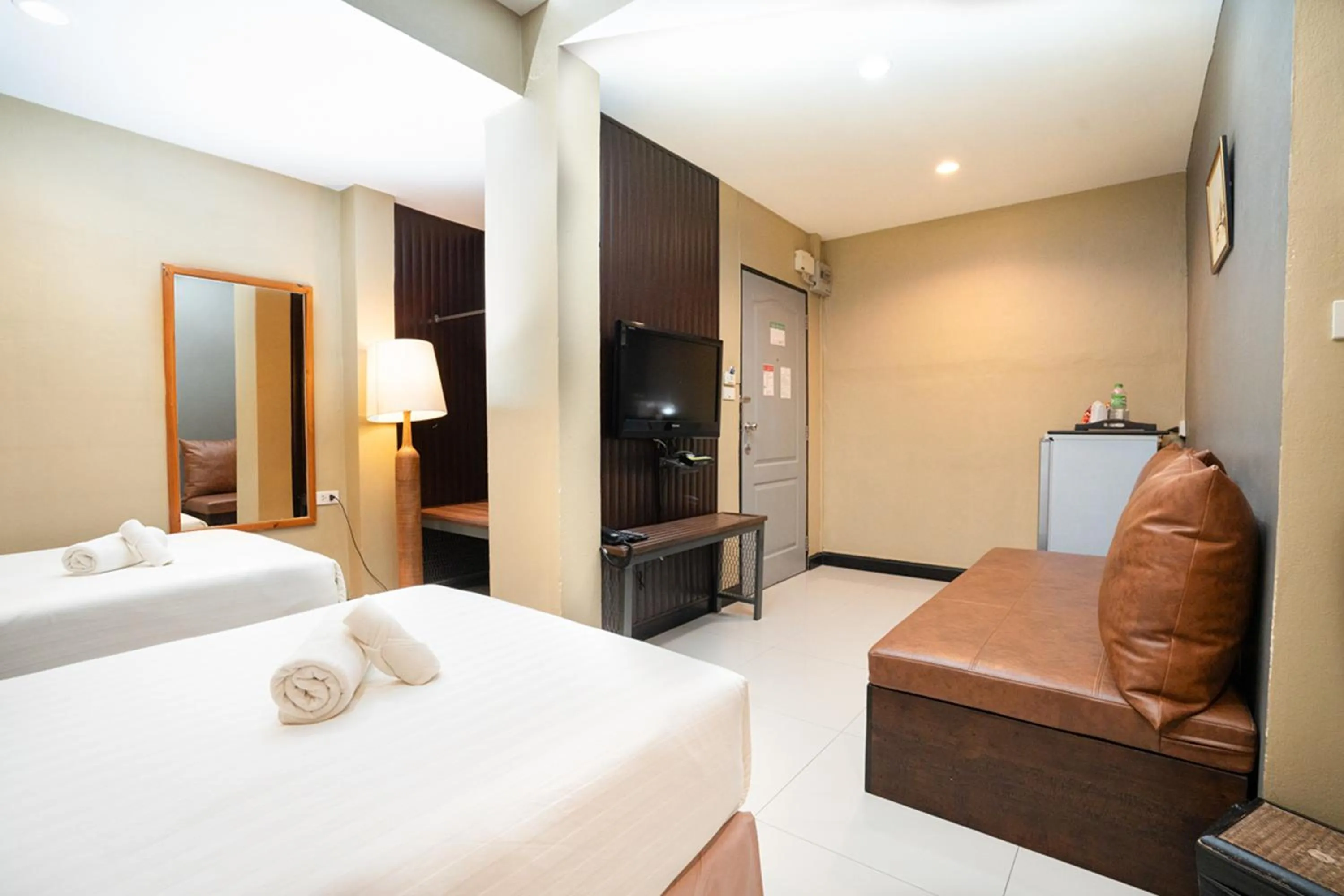 Bed in The Palm Hotel