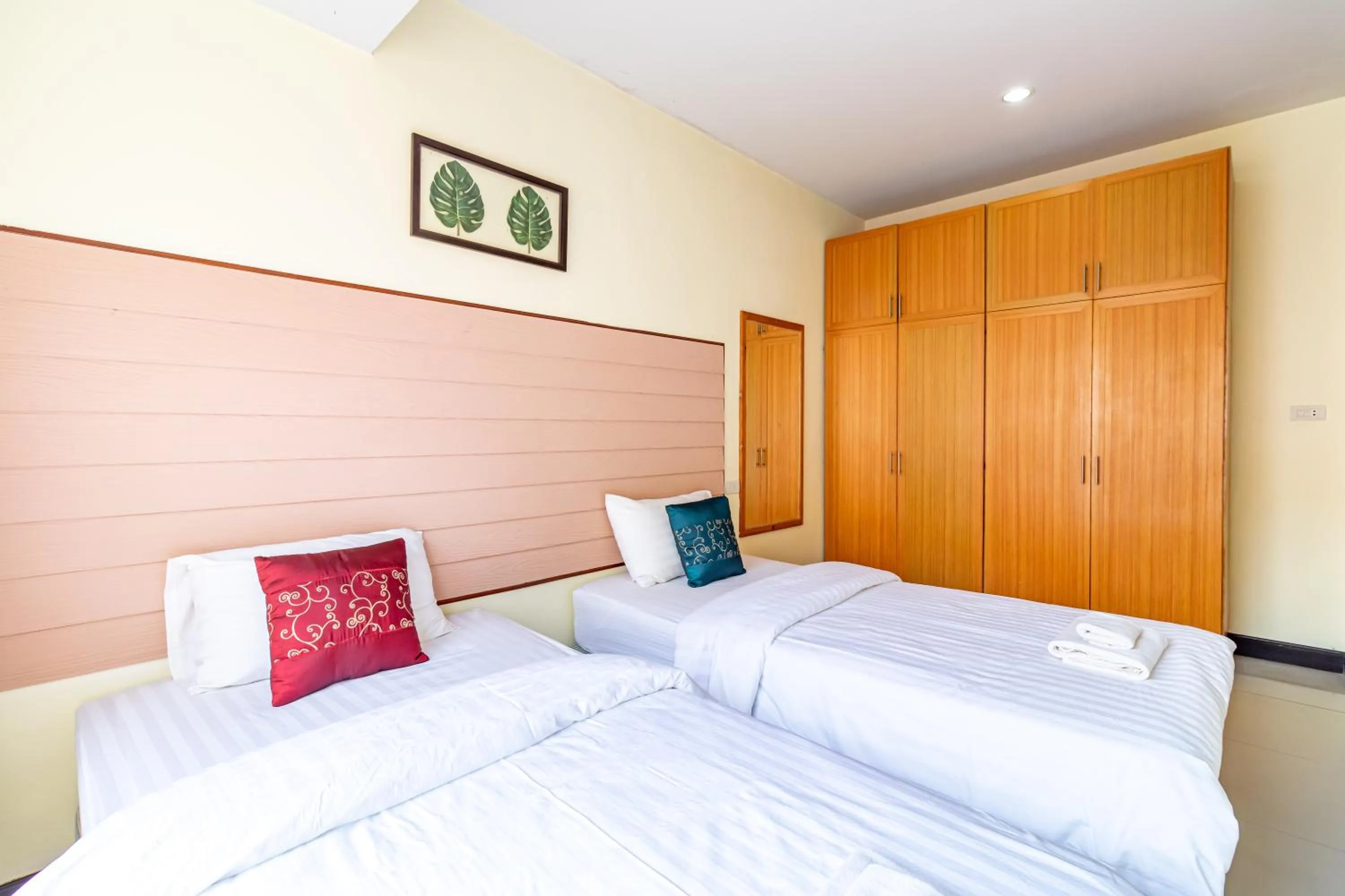 Bed in The Palm Hotel