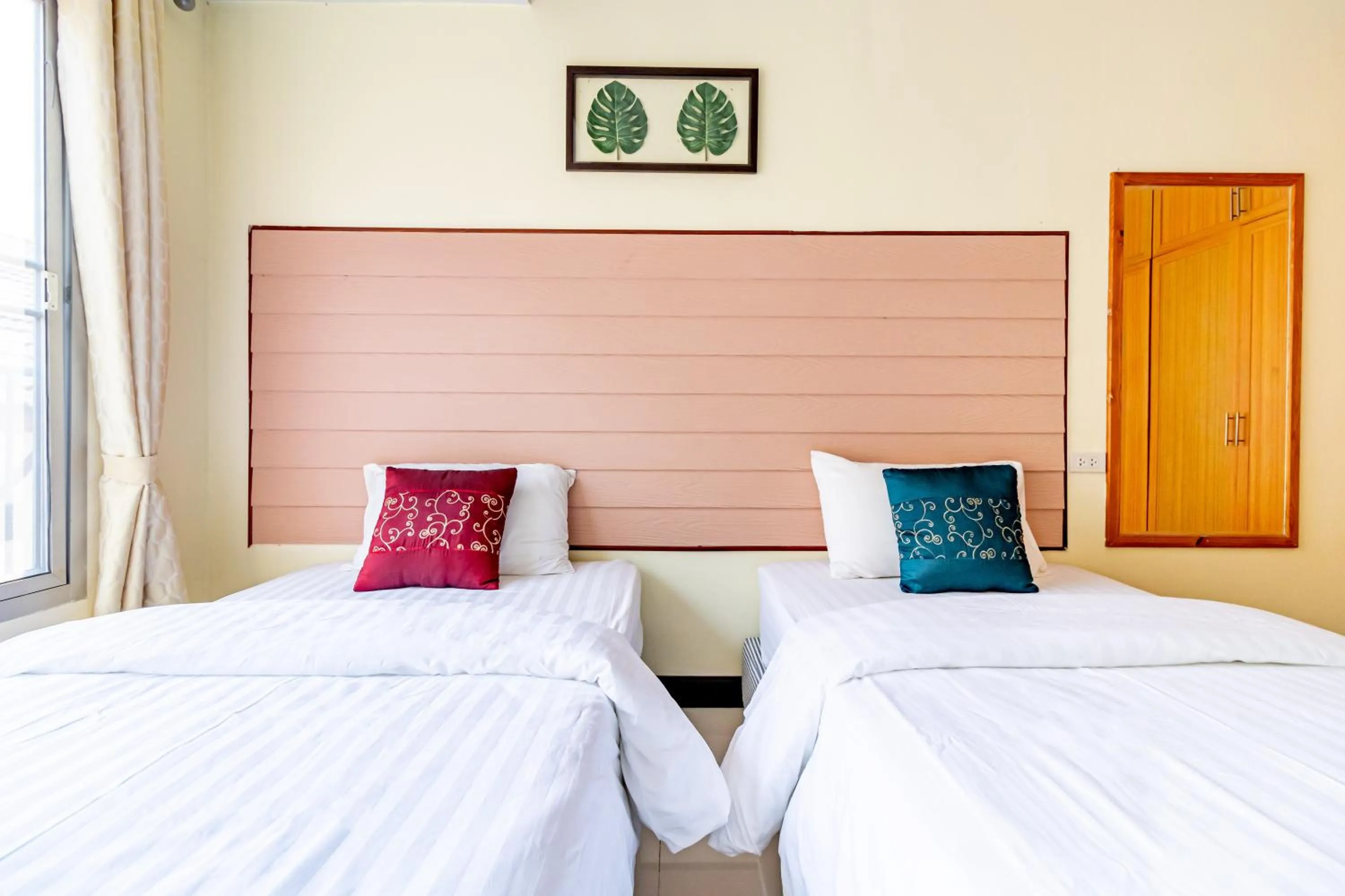 Bed in The Palm Hotel