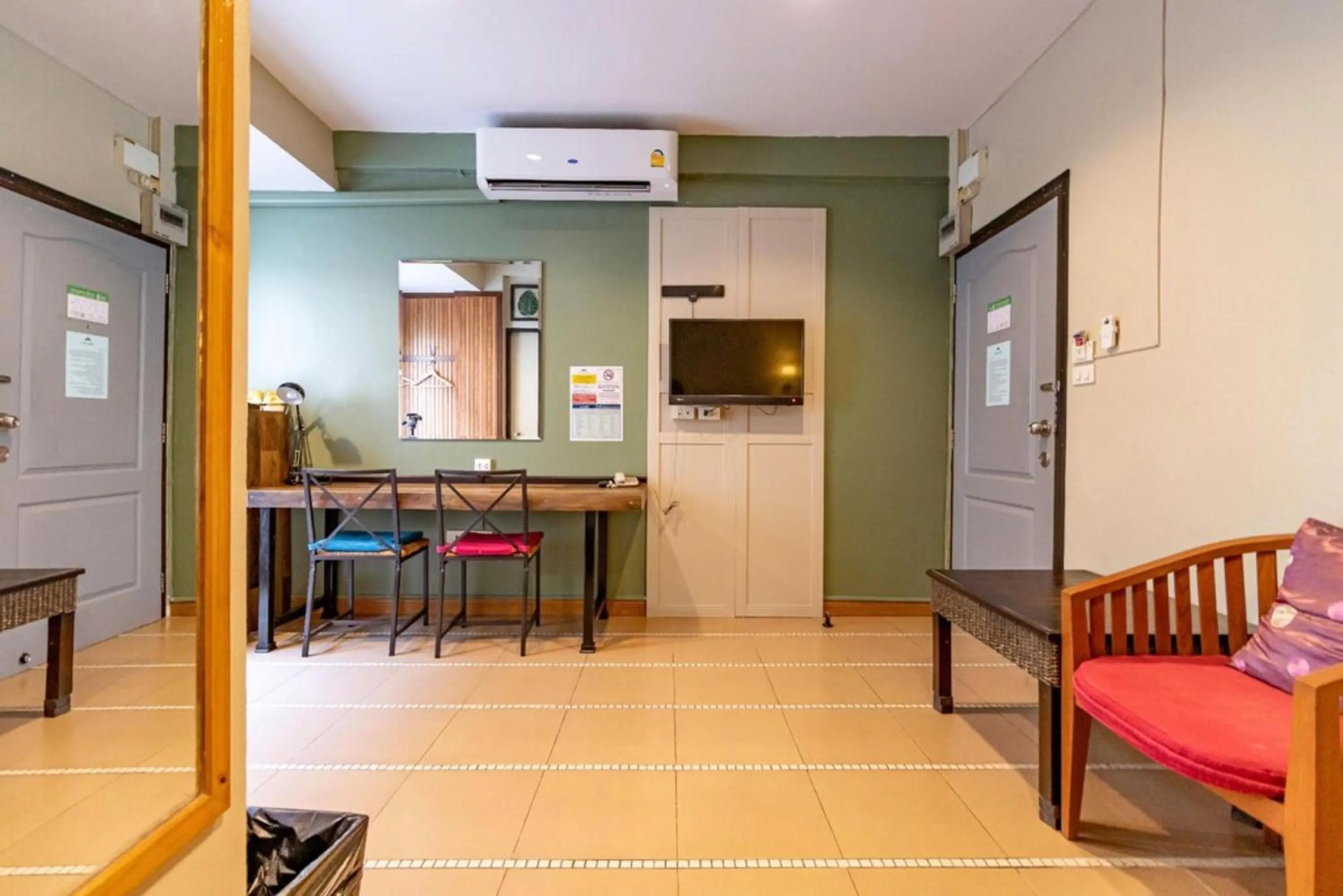 Bedroom in The Palm Hotel