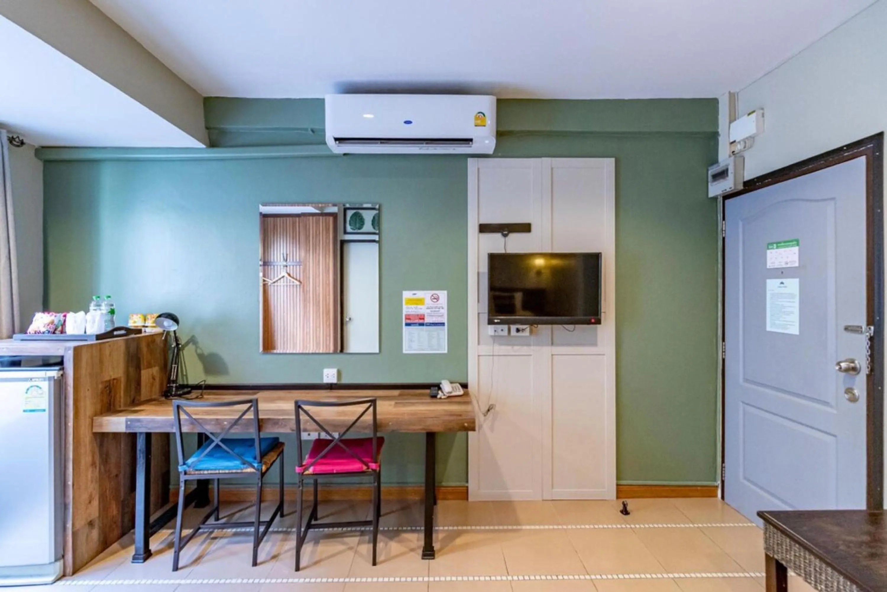 Bedroom in The Palm Hotel