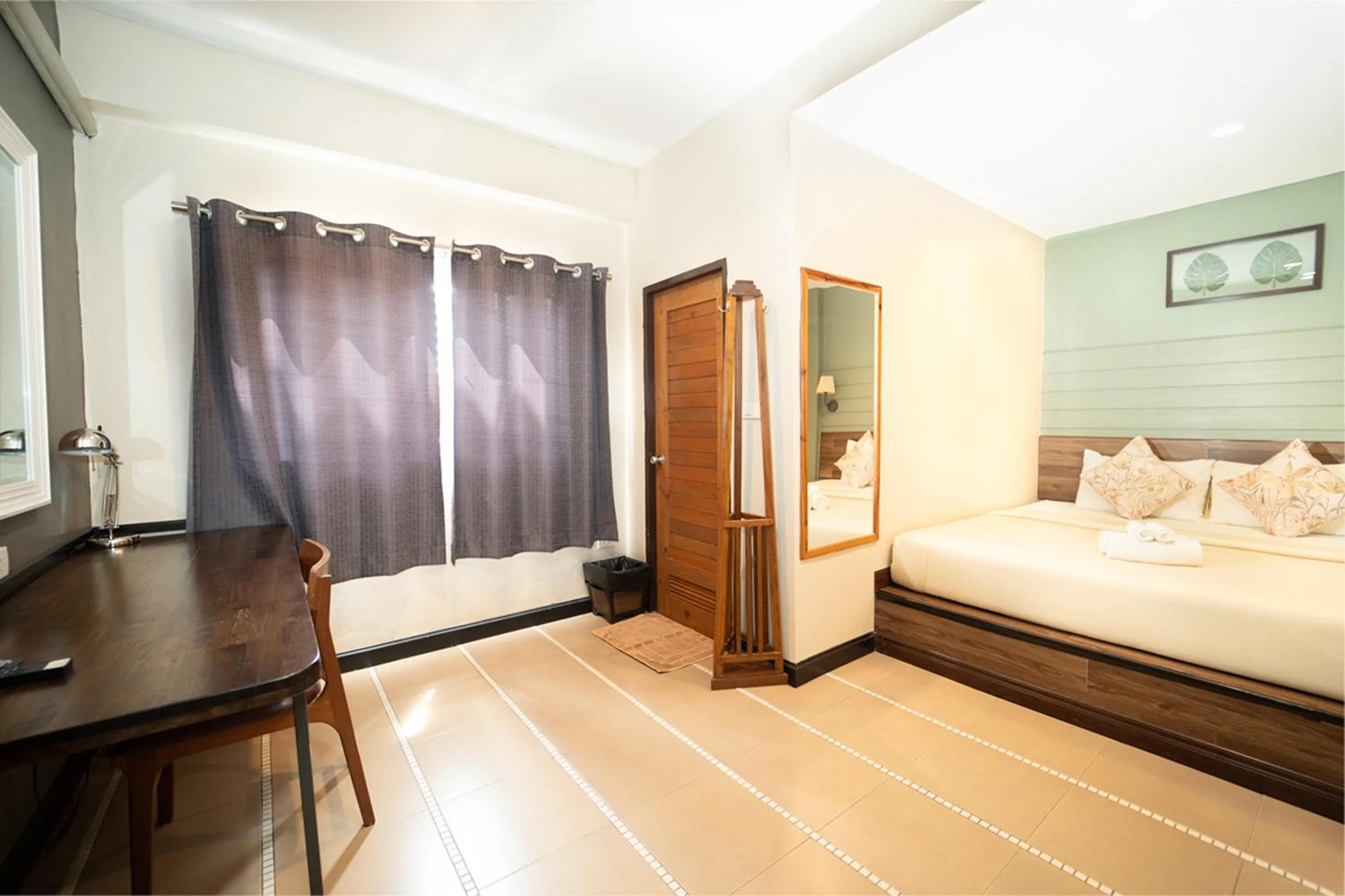 Bed in The Palm Hotel