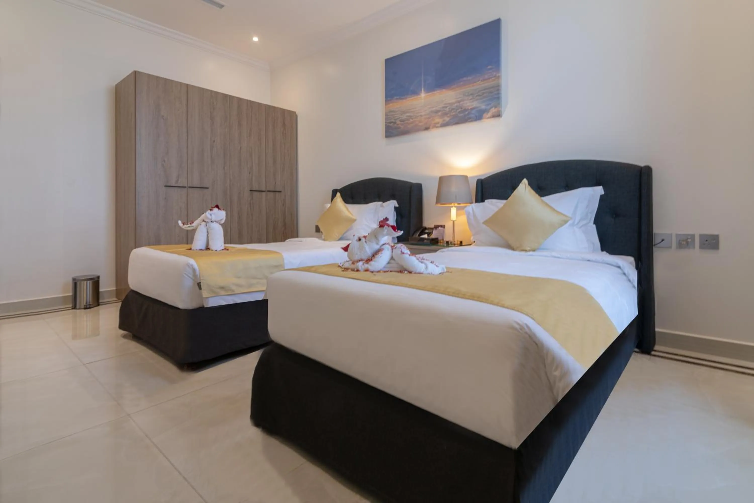 Bed in The Gate Hotel and Apartments