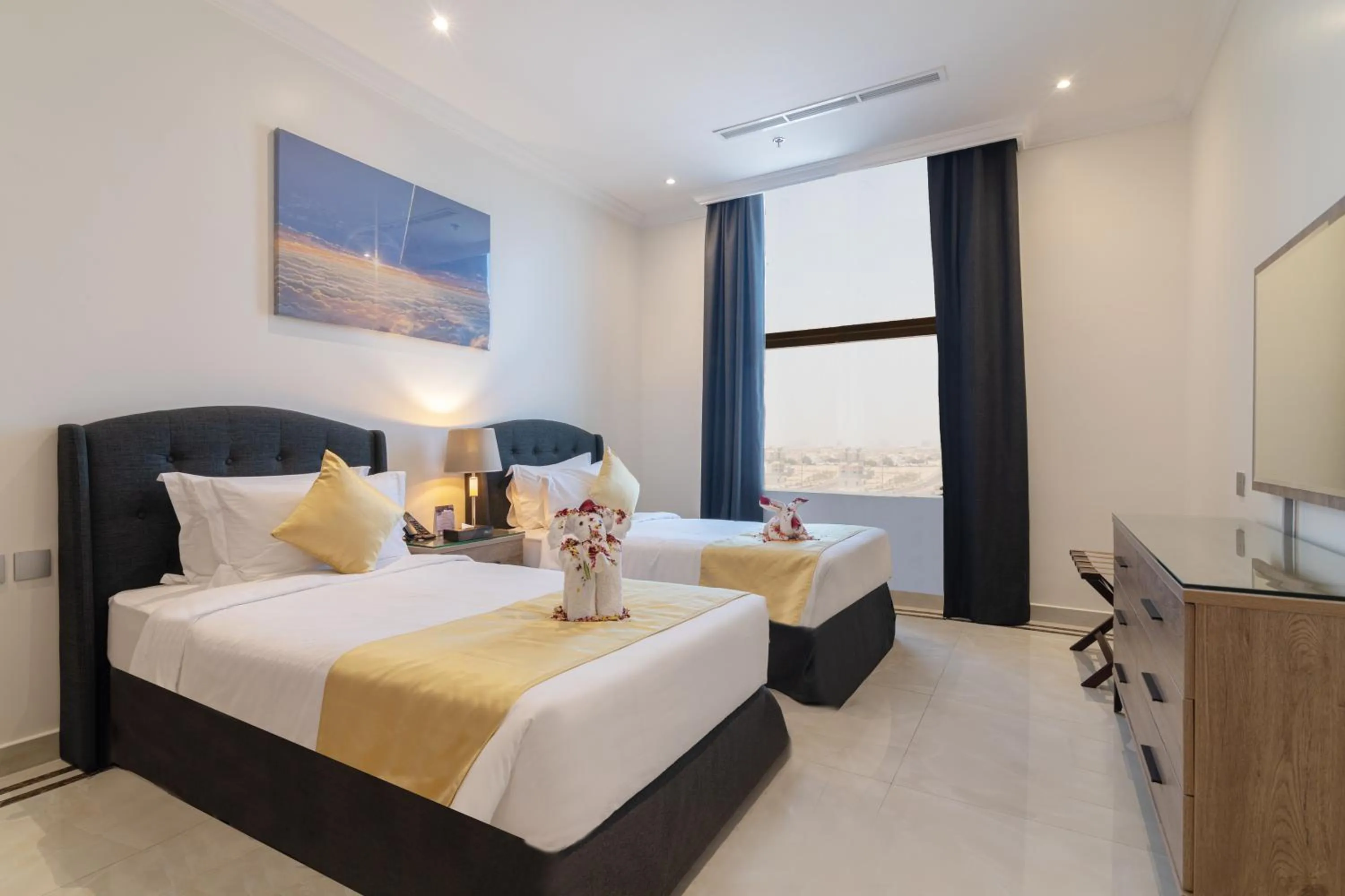 Bed in The Gate Hotel and Apartments