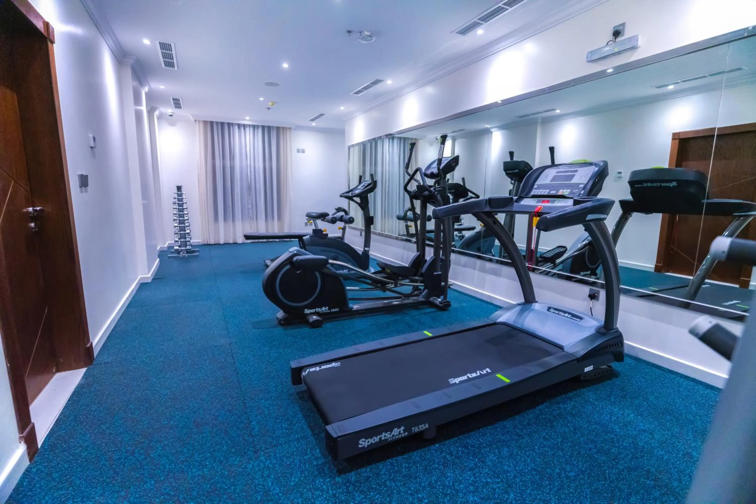 Fitness centre/facilities in The Gate Hotel and Apartments