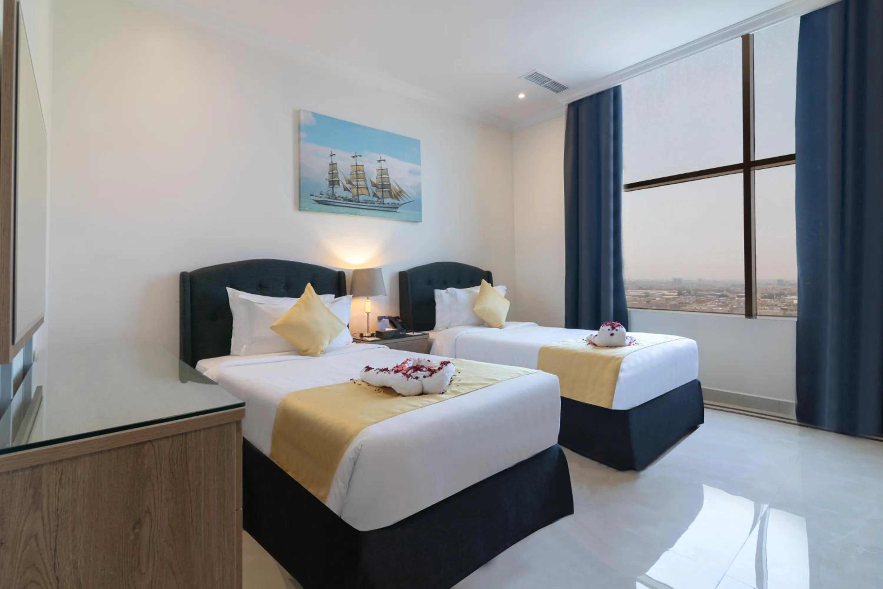 Bed in The Gate Hotel and Apartments