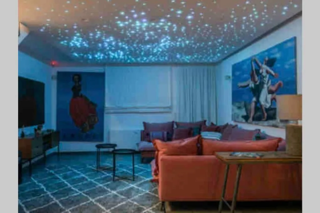 Seating area in Opsis Luxury Villa with swimming pool