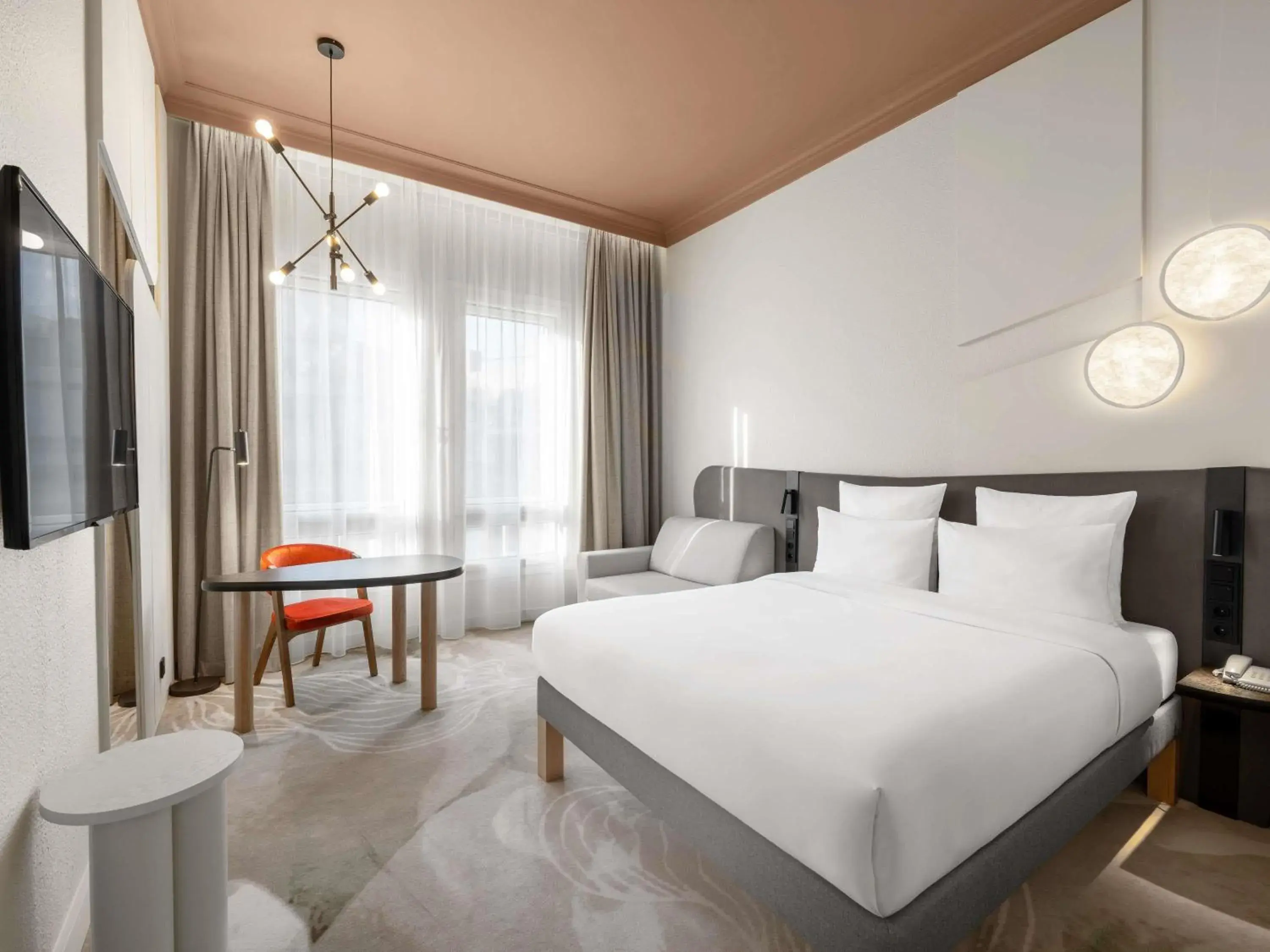 Superior Room with One Double Bed and Sofa Bed in Mövenpick Hotel Budapest Centre Superior Room with One Double Bed and Sofa Bed in Mövenpick Hotel Budapest Centre